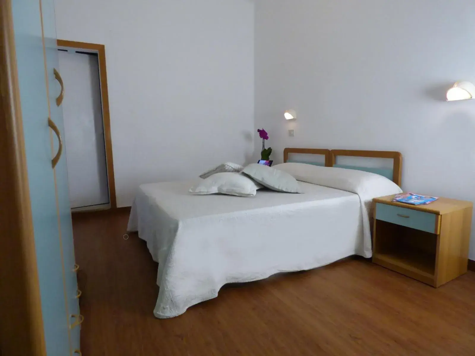 Triple Room in Hotel Merano Triple Room in Hotel Merano