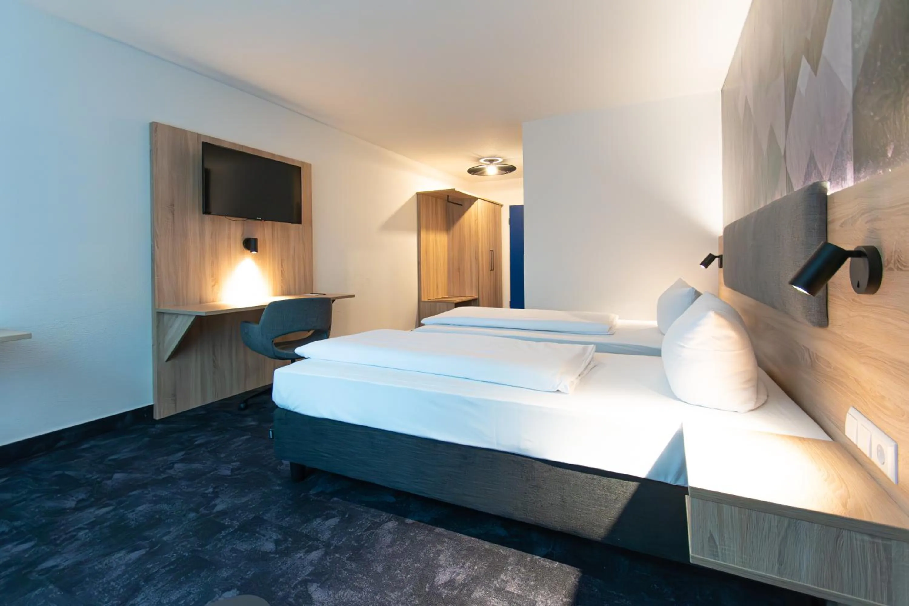 Photo of the whole room, Bed in Taste Hotel Jettingen