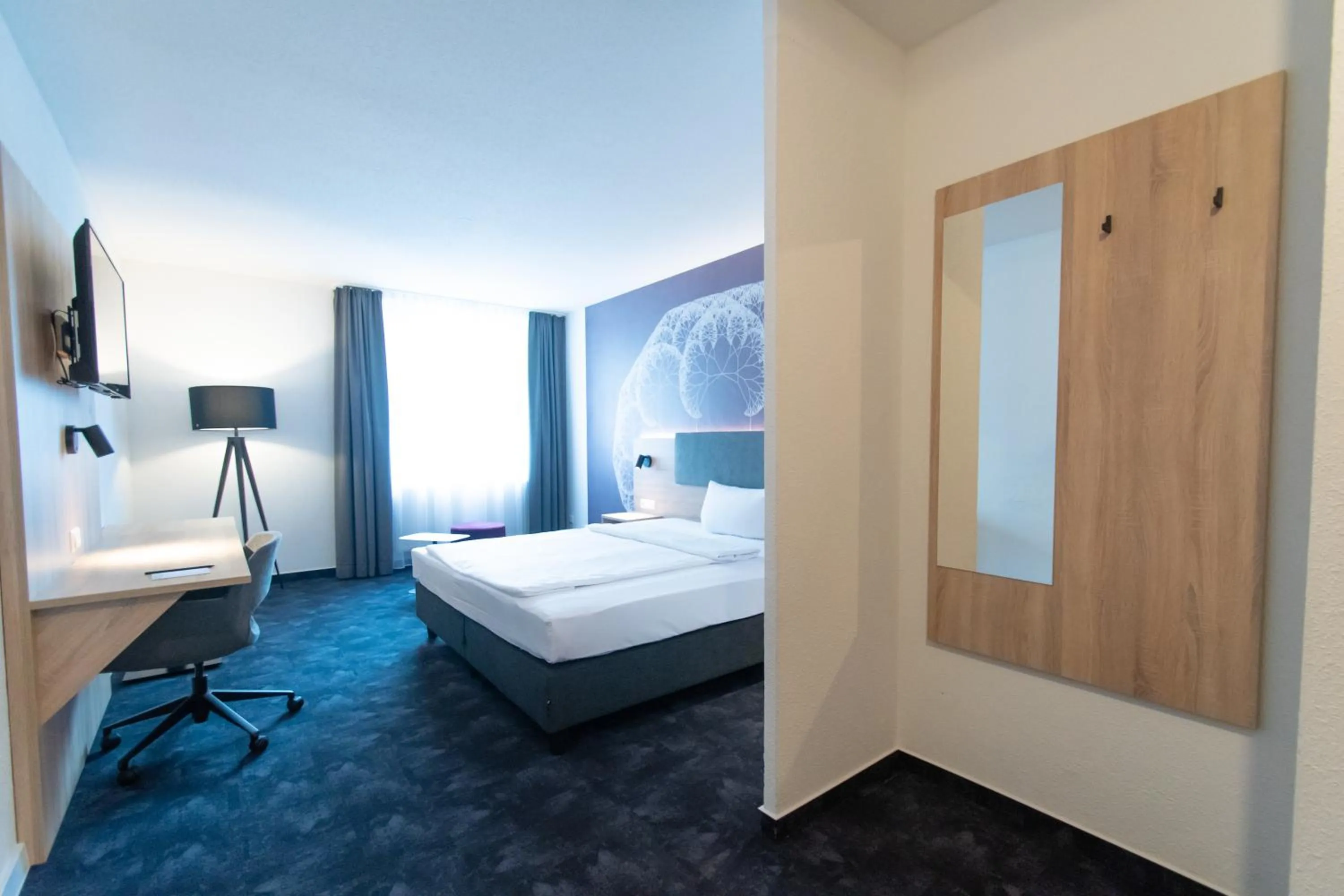 Photo of the whole room, Bed in Taste Hotel Jettingen