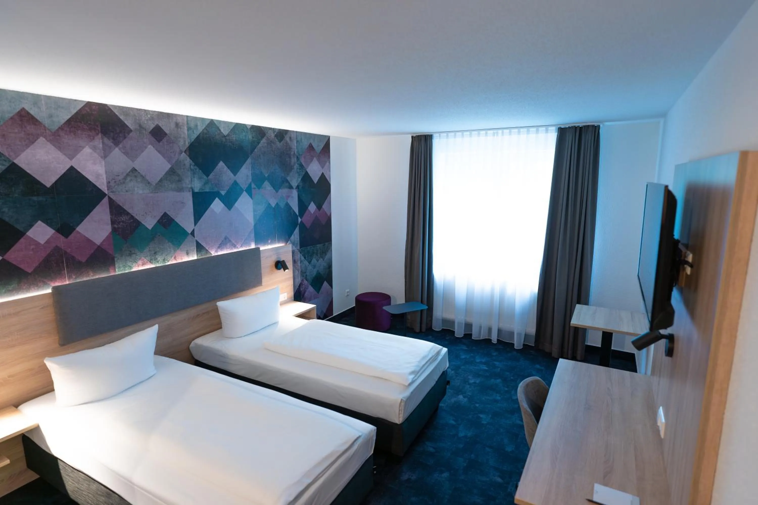 Photo of the whole room, Bed in Taste Hotel Jettingen