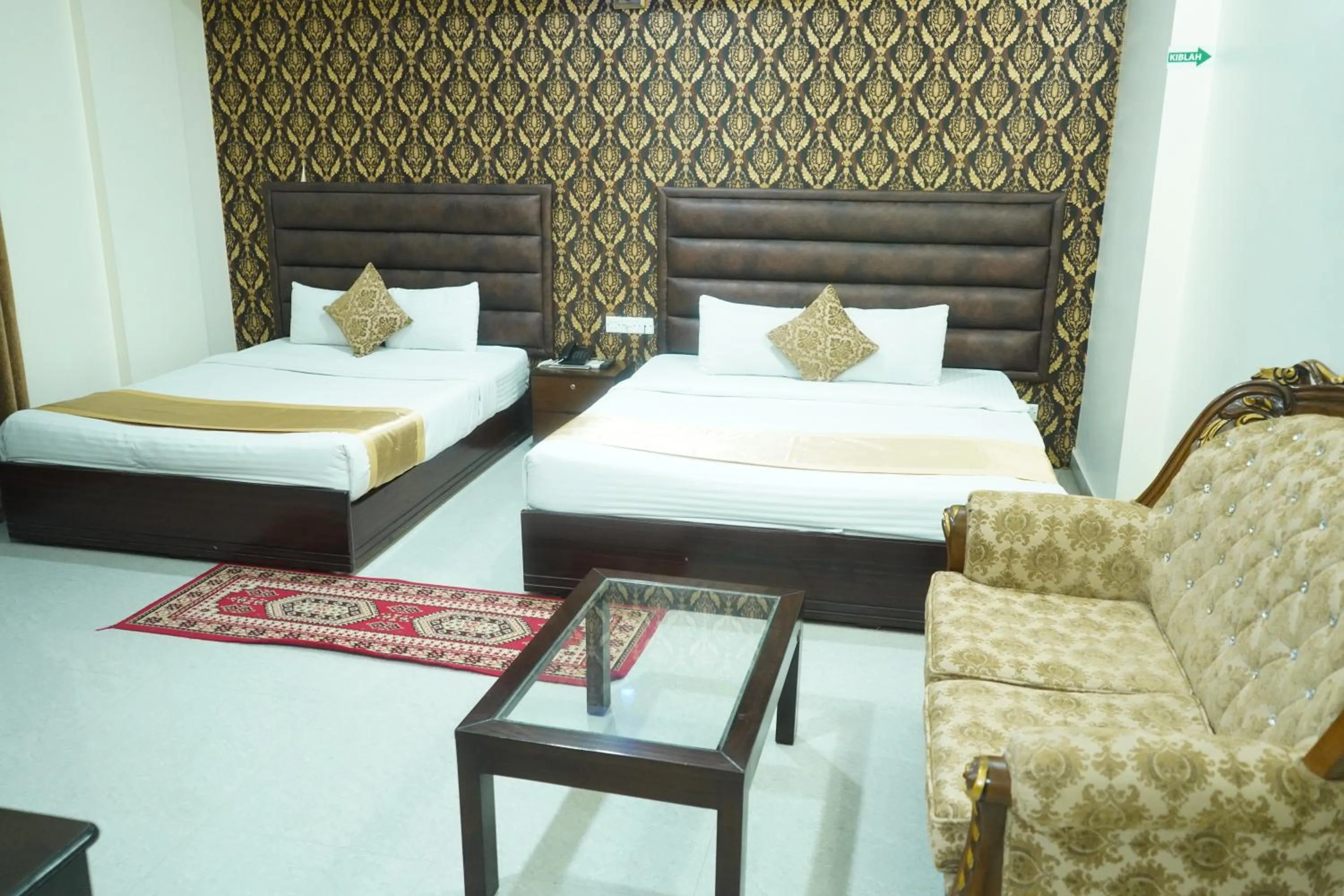 Bed in Grand Mostafa Hotel Ababil