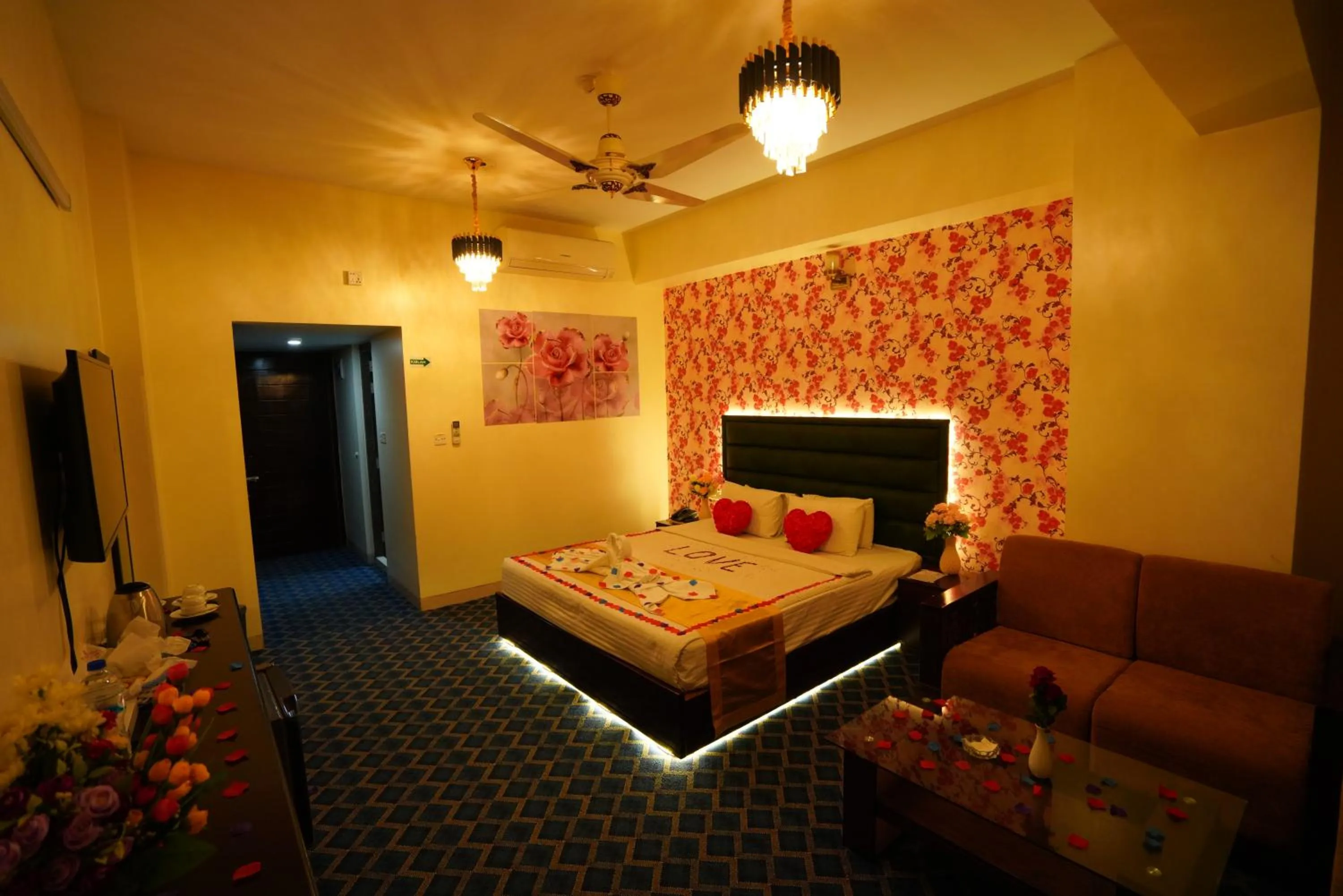 Communal lounge/ TV room, Bed in Grand Mostafa Hotel Ababil