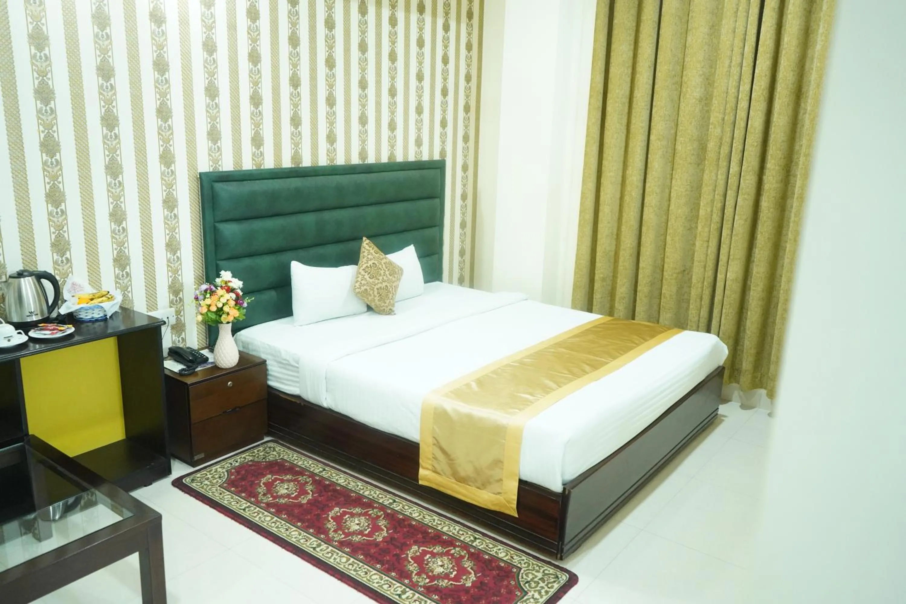 Bed in Grand Mostafa Hotel Ababil