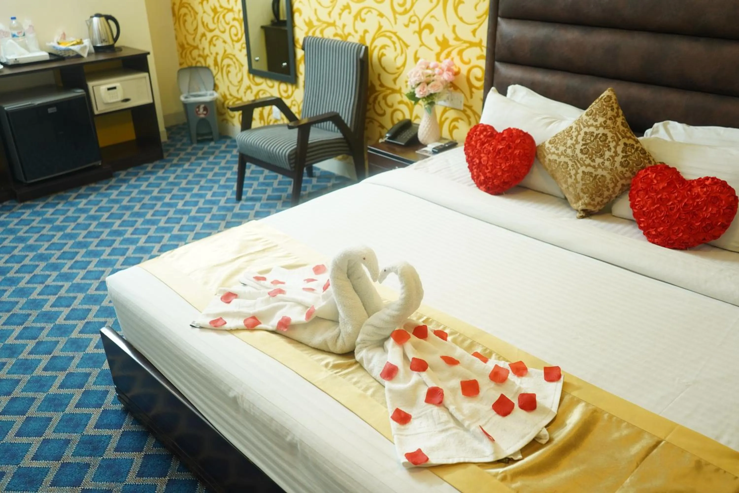 Bed in Grand Mostafa Hotel Ababil