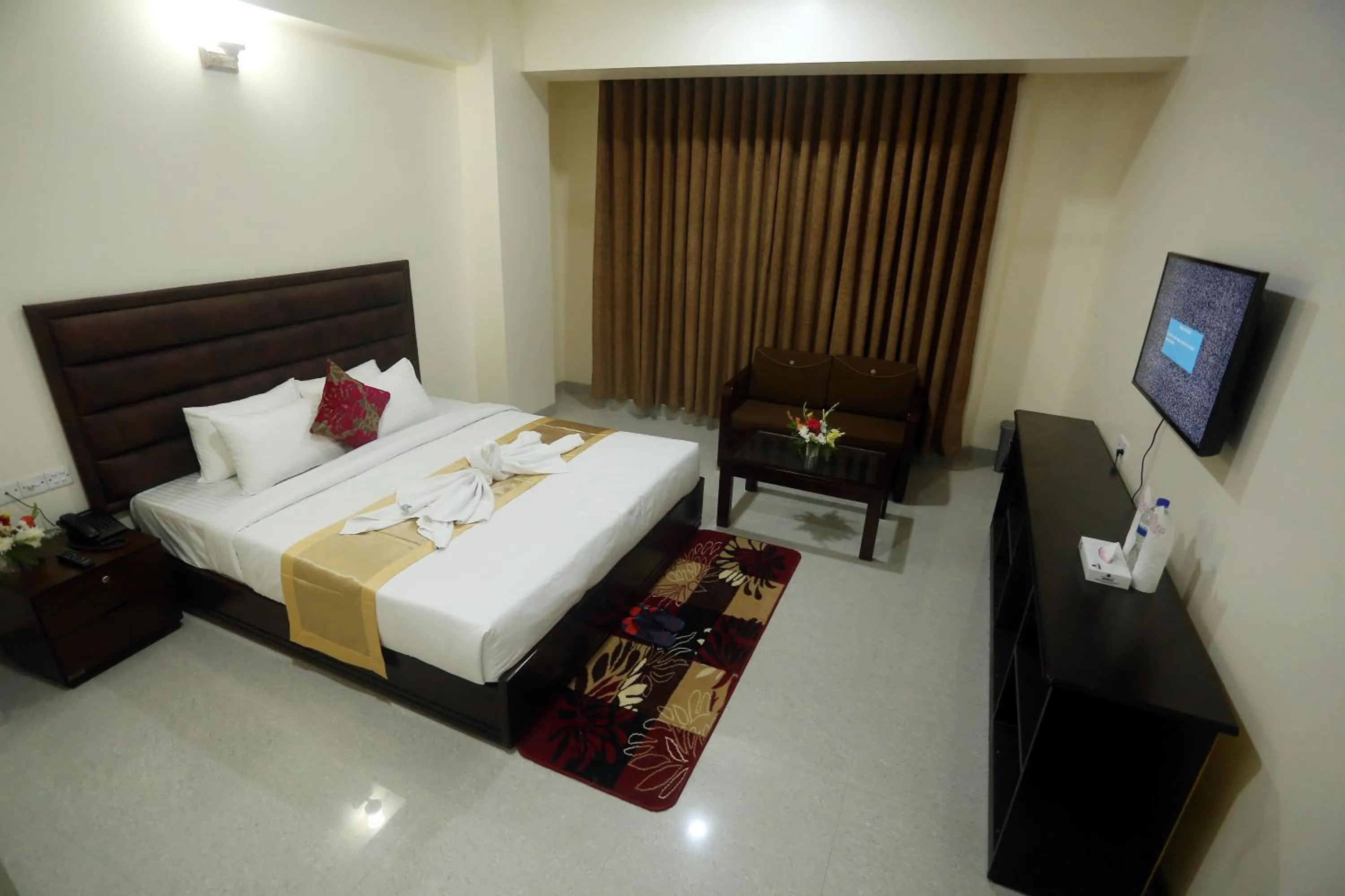 Bed in Grand Mostafa Hotel Ababil