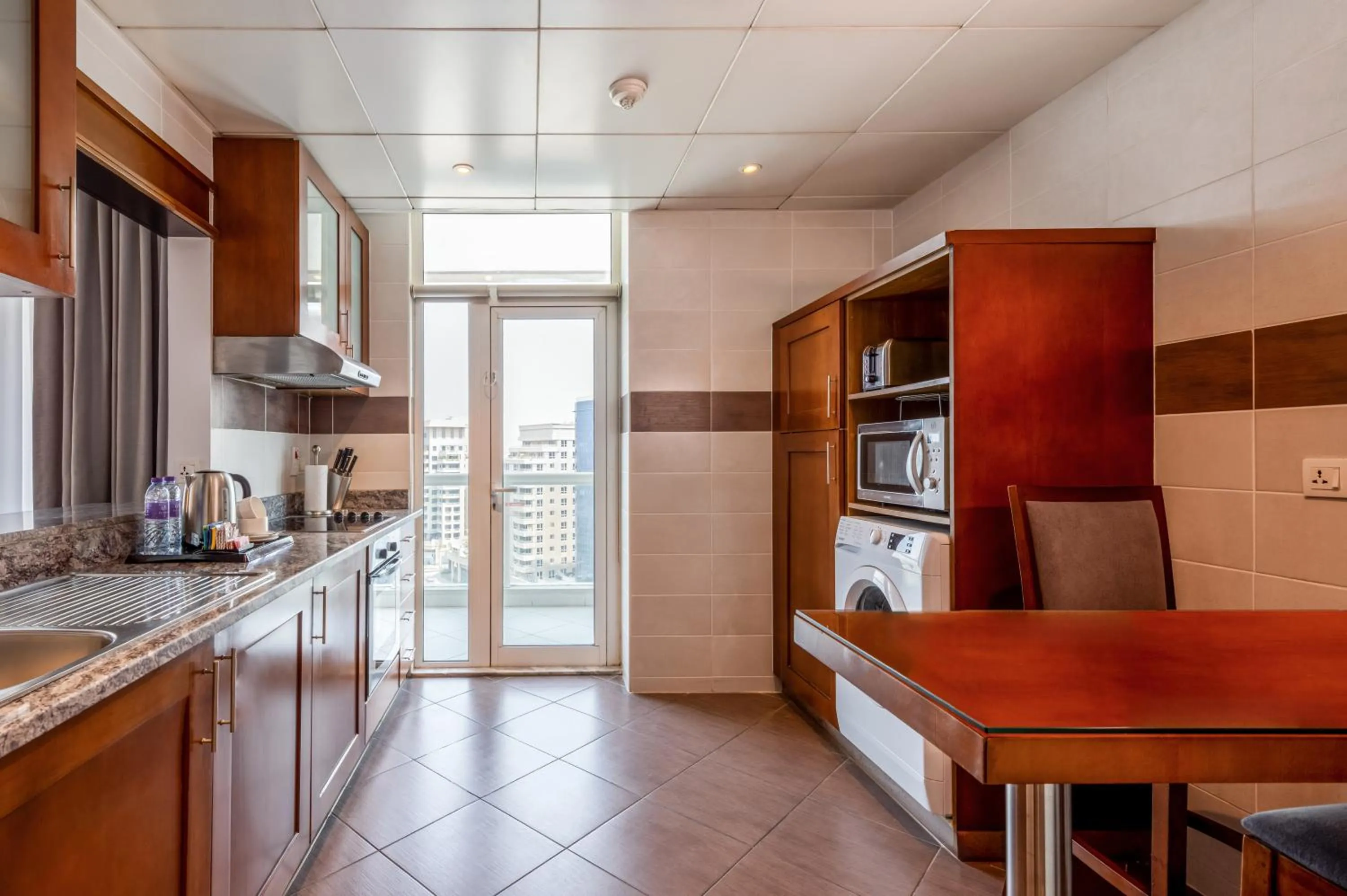 kitchen in Flora Creek Deluxe Hotel Apartments, Dubai