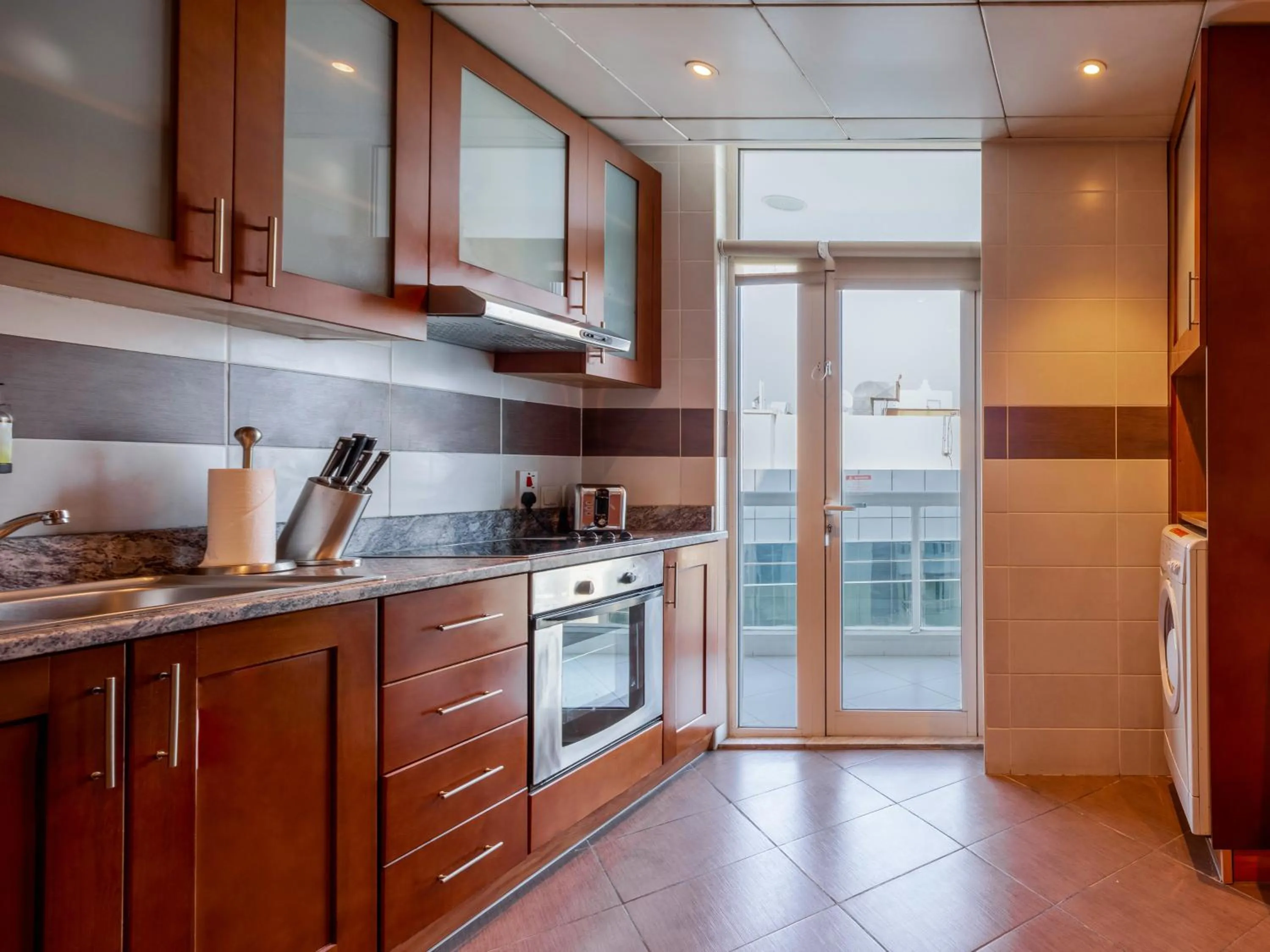 Kitchen or kitchenette in Flora Creek Deluxe Hotel Apartments, Dubai