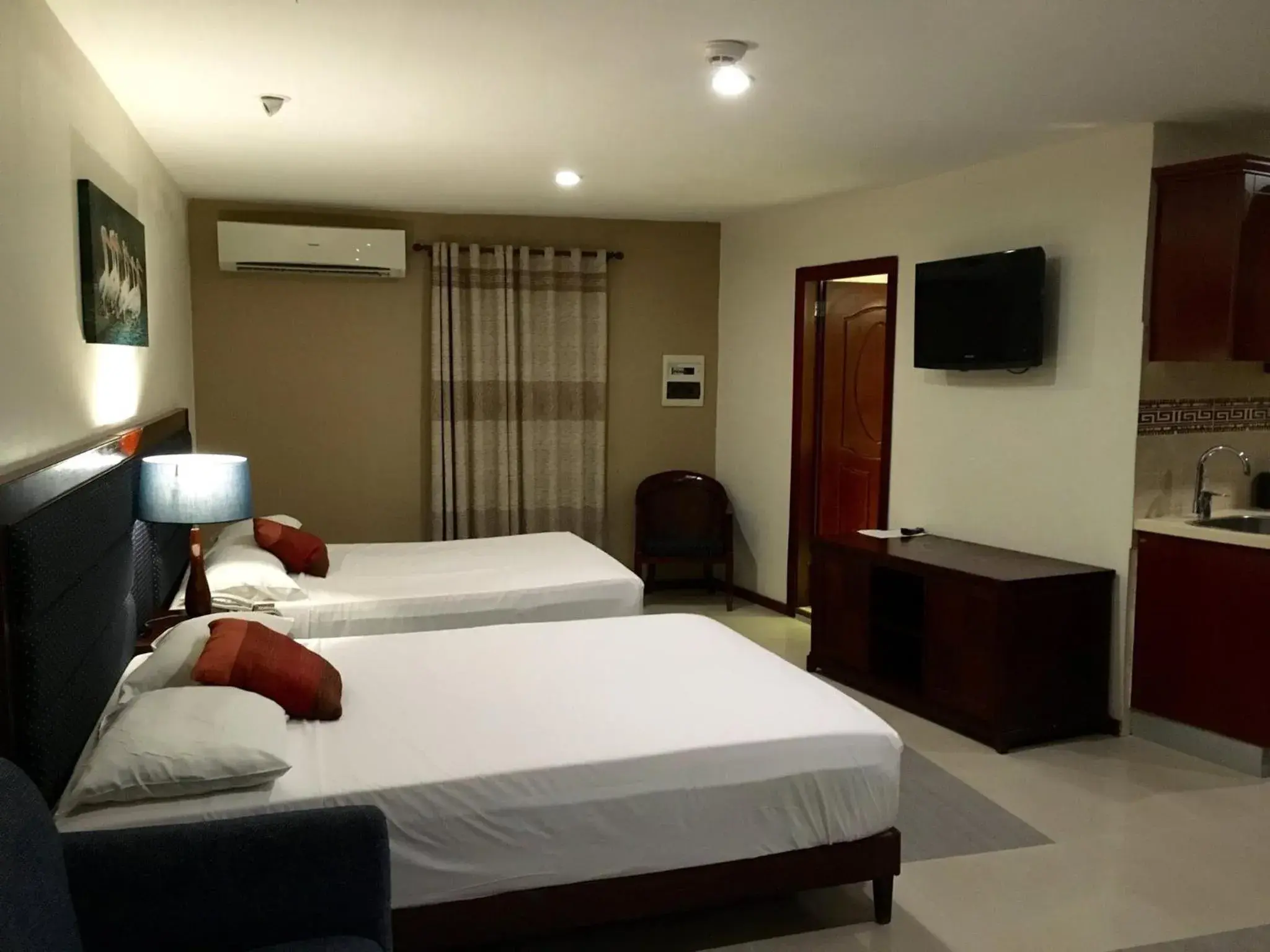 Bed in Curacao Suites Hotel Bed in Curacao Suites Hotel