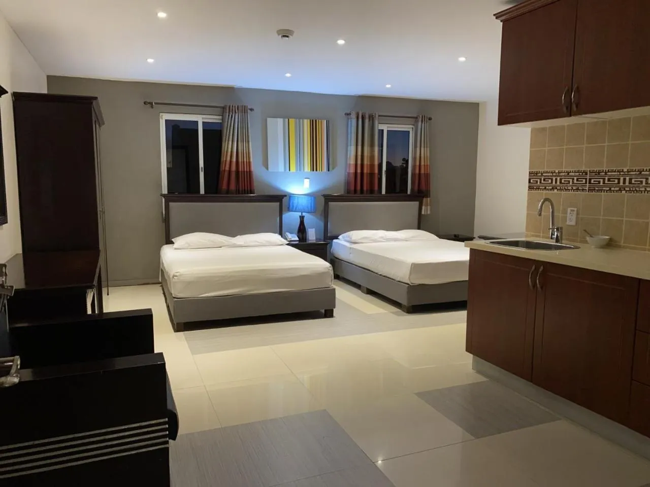 Bed in Curacao Suites Hotel