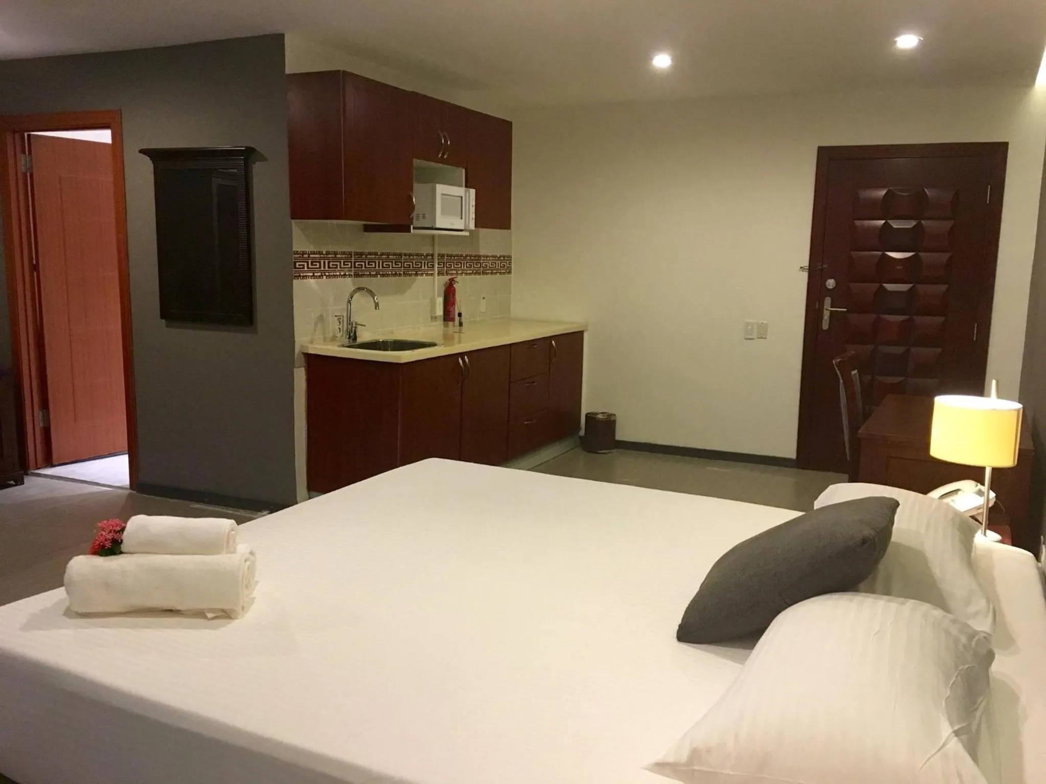 Bed in Curacao Suites Hotel