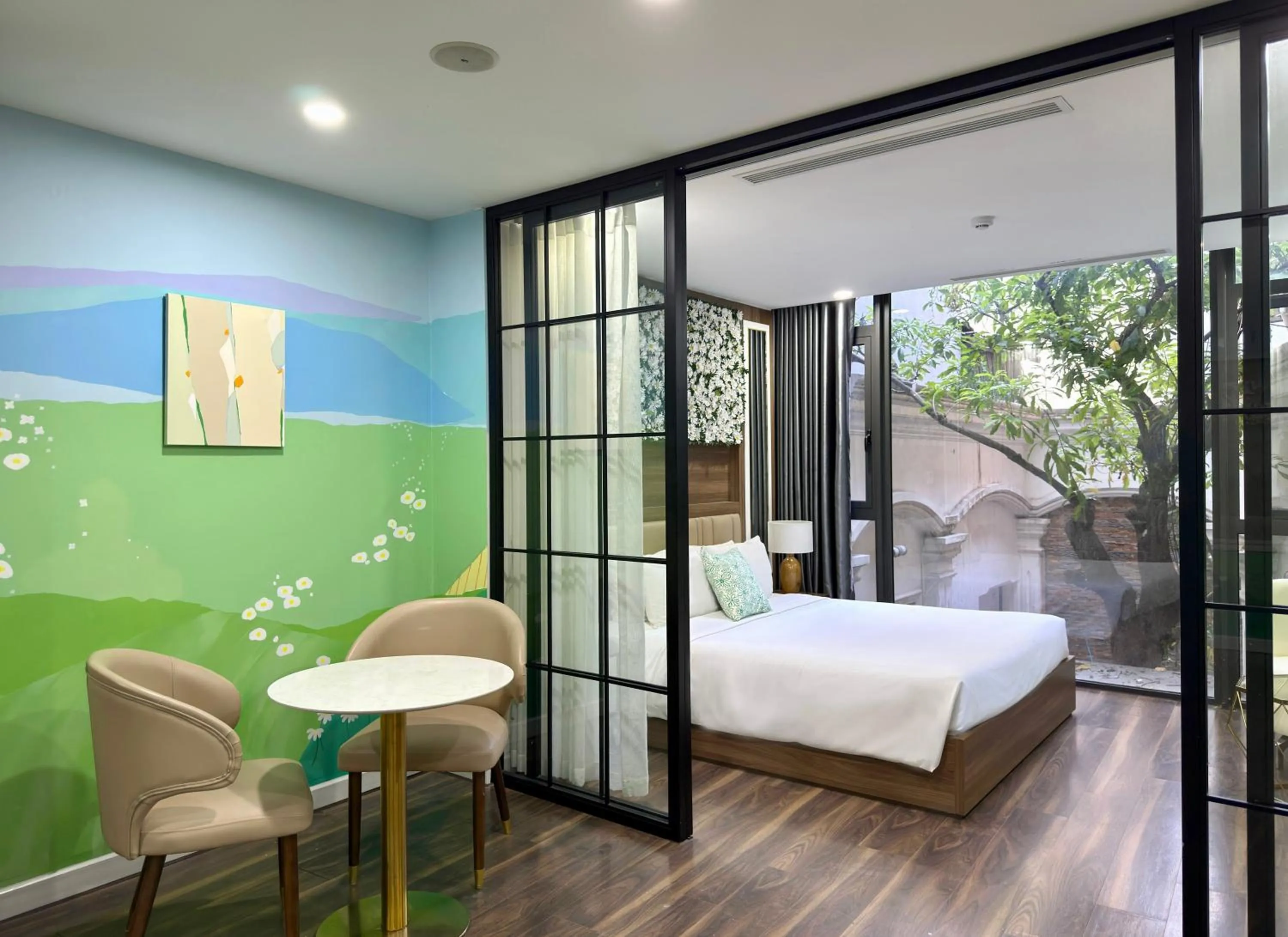 Seating area, Bed in LIVIE Hanoi Ham Long