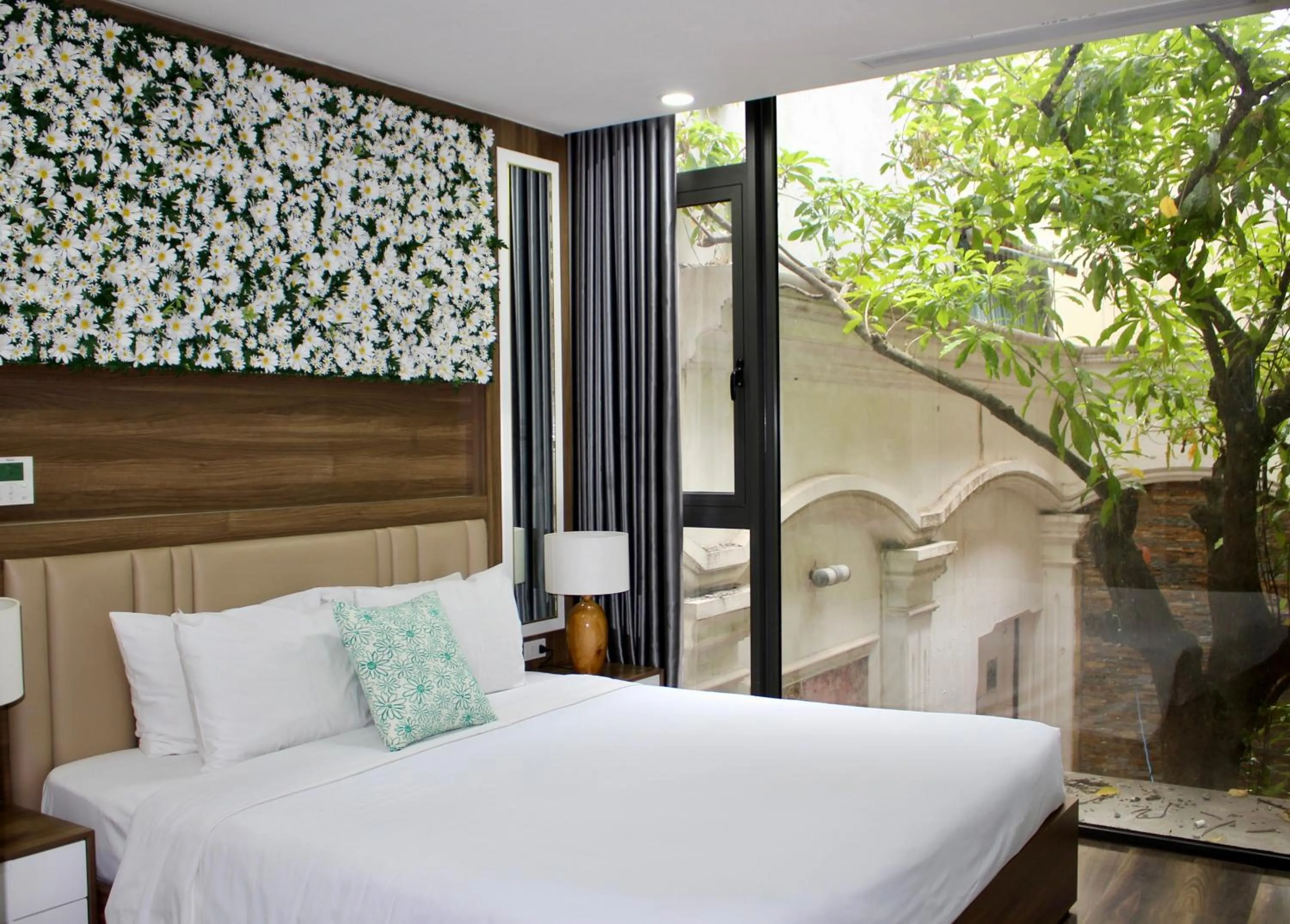 Bed in LIVIE Hanoi Ham Long