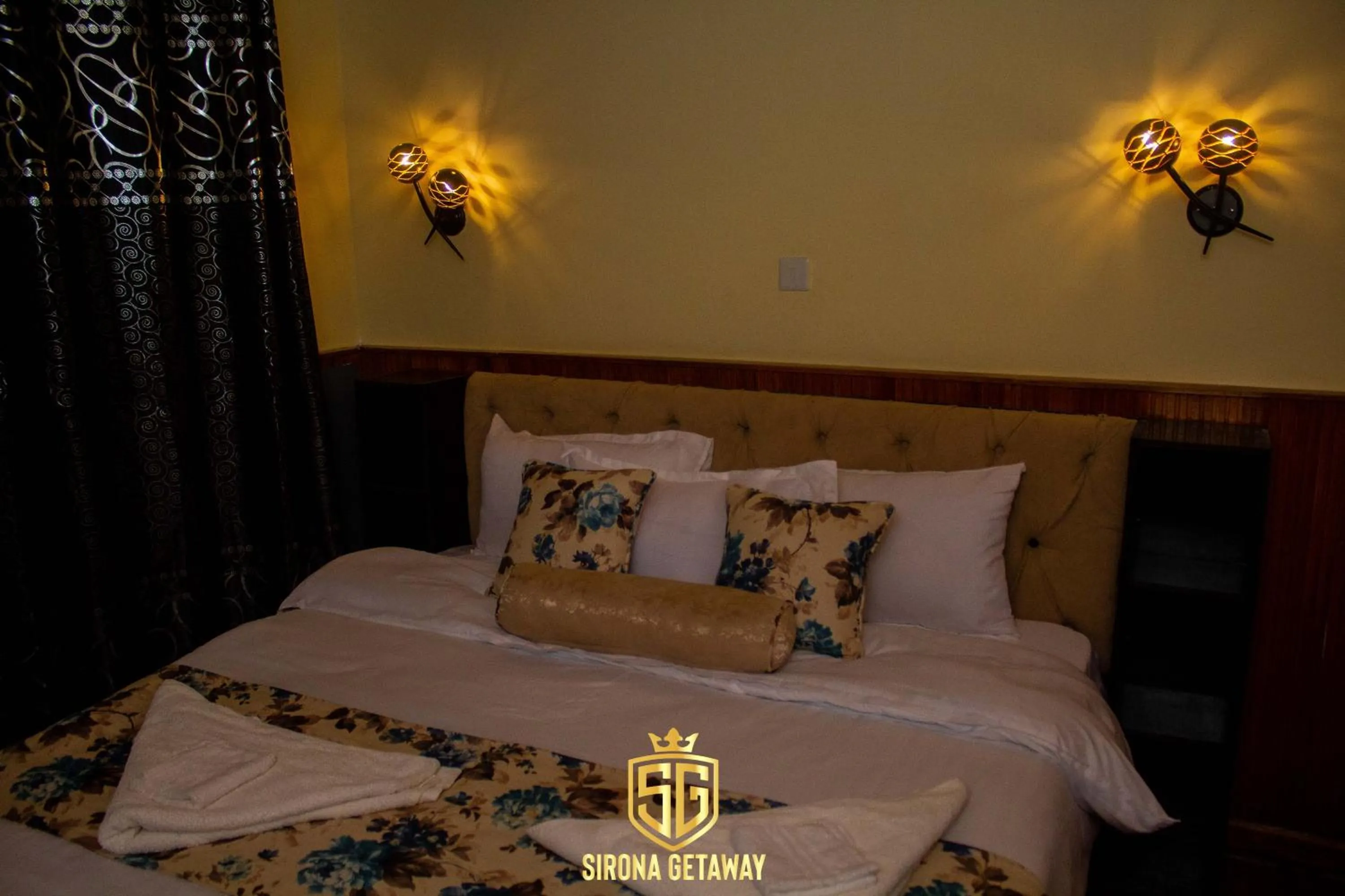 Bed in Sirona Getaway Hotel