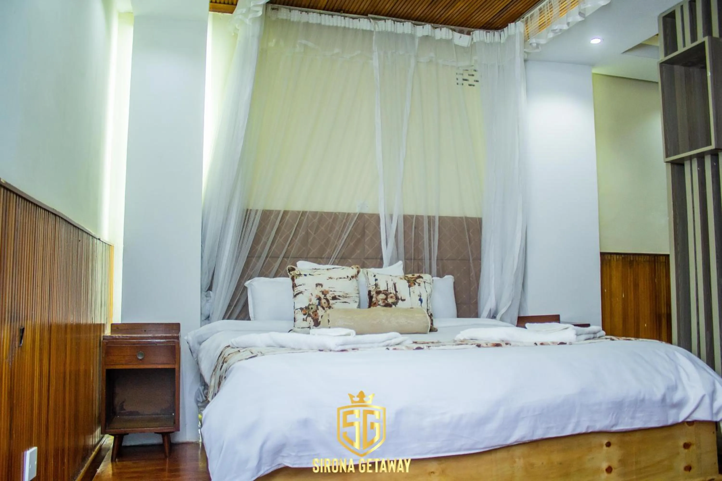 Bed in Sirona Getaway Hotel