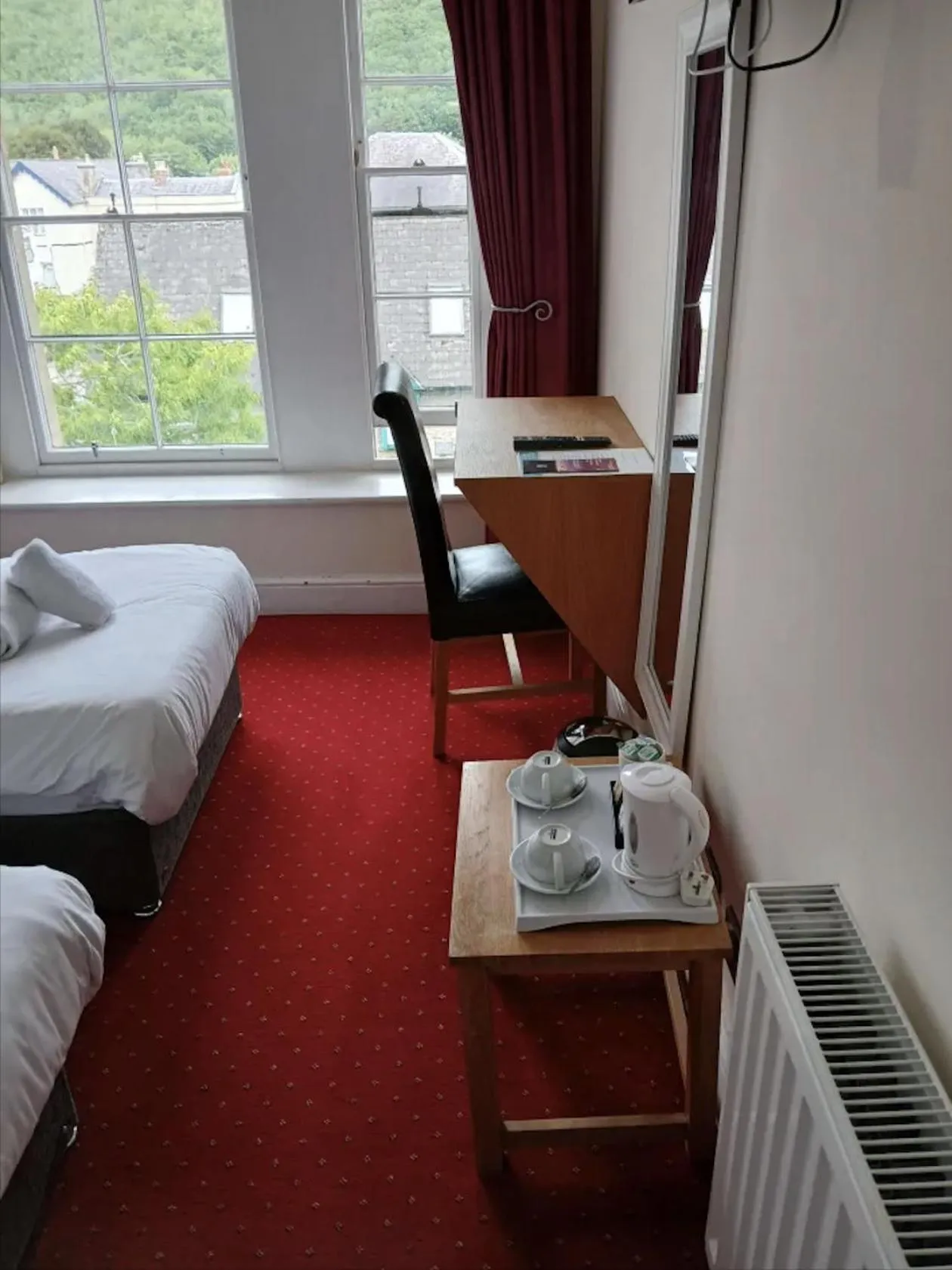 Seating area, Bed in The Knighton Hotel