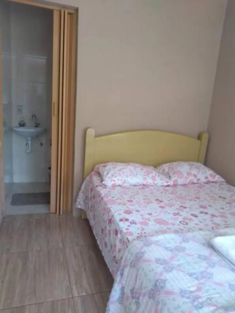 Bed in Pousada do Ribeirão