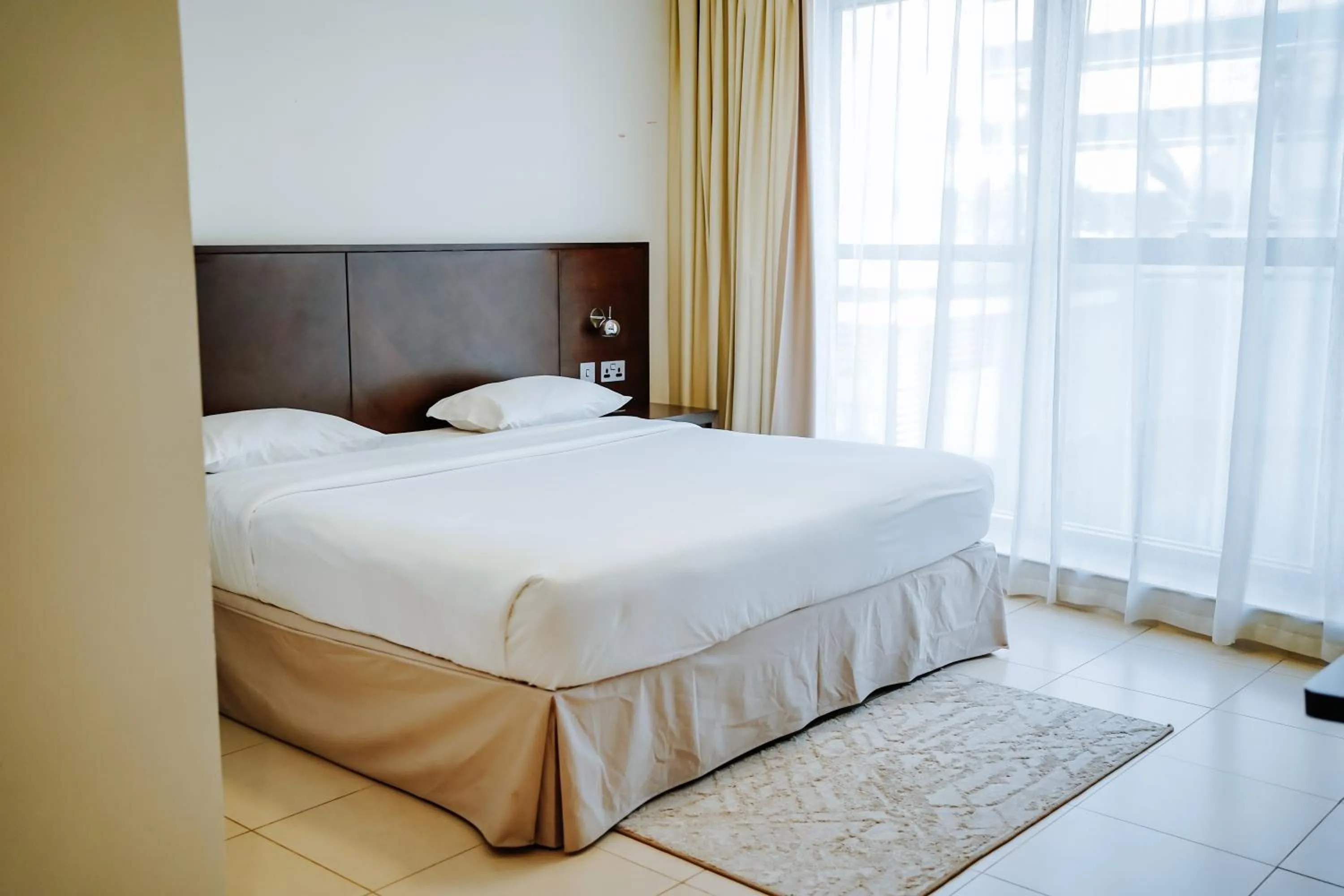 Bedroom, Bed in MENA ApartHotel Albarsha At The Mall