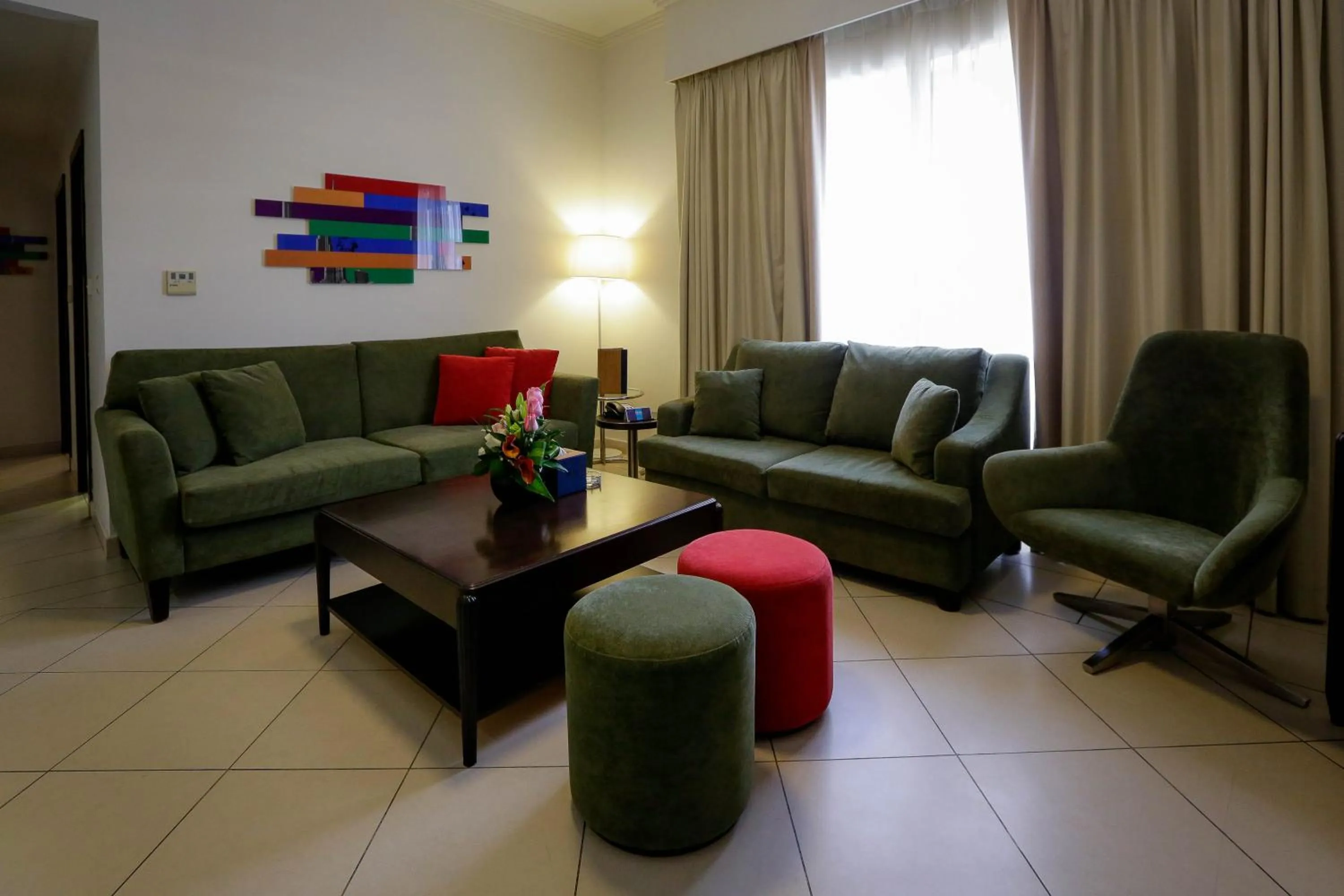 Living room in MENA ApartHotel Albarsha At The Mall