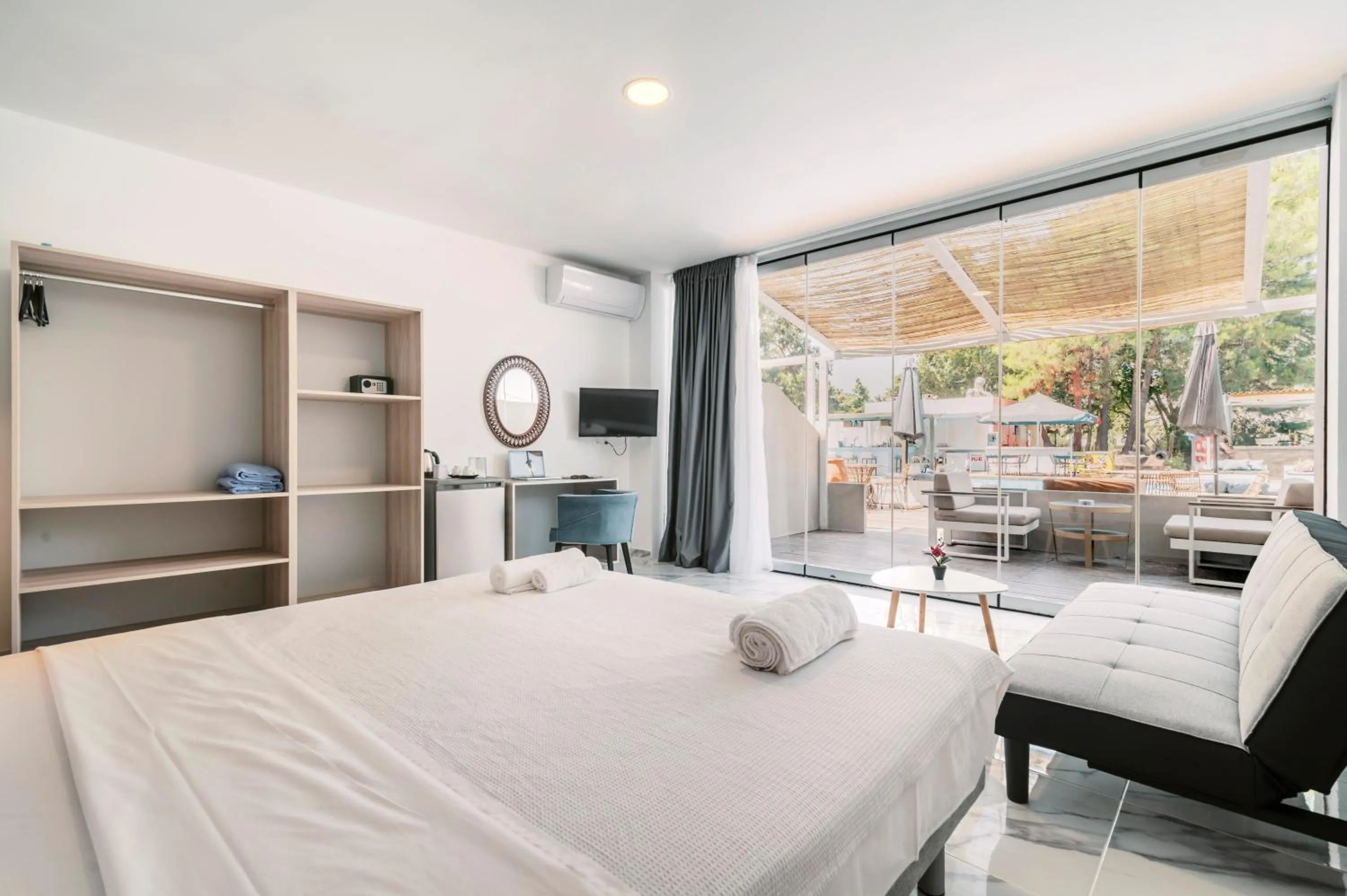 Pool view, Bed in Bamboo Suites Hotel - Adults Only