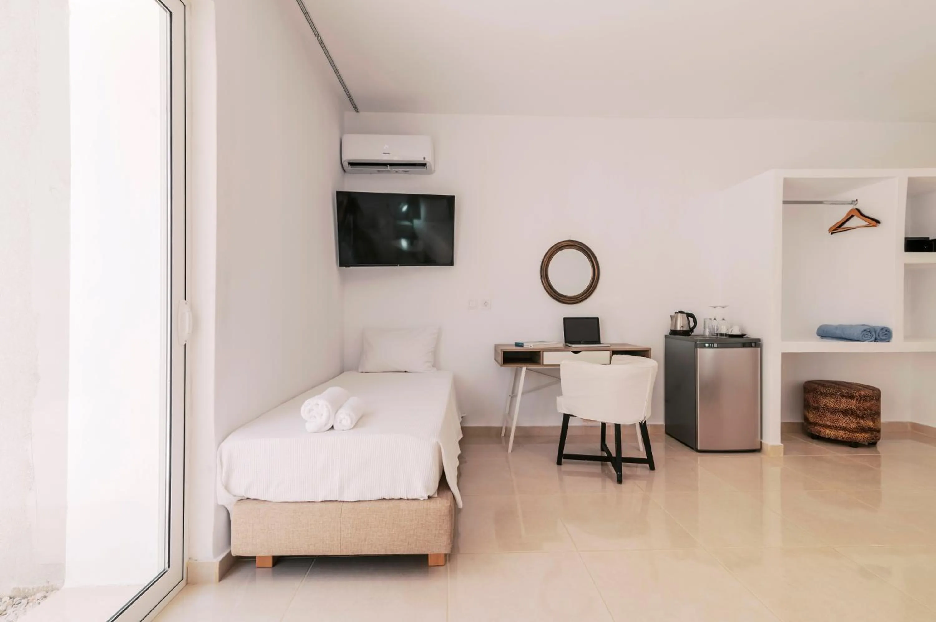 Photo of the whole room, Bed in Bamboo Suites Hotel - Adults Only