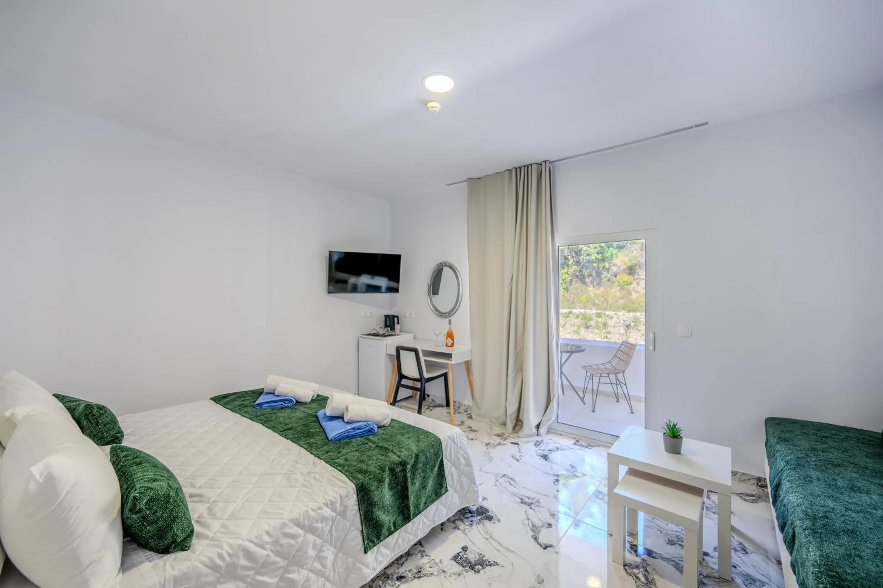 Bed in Bamboo Suites Hotel - Adults Only