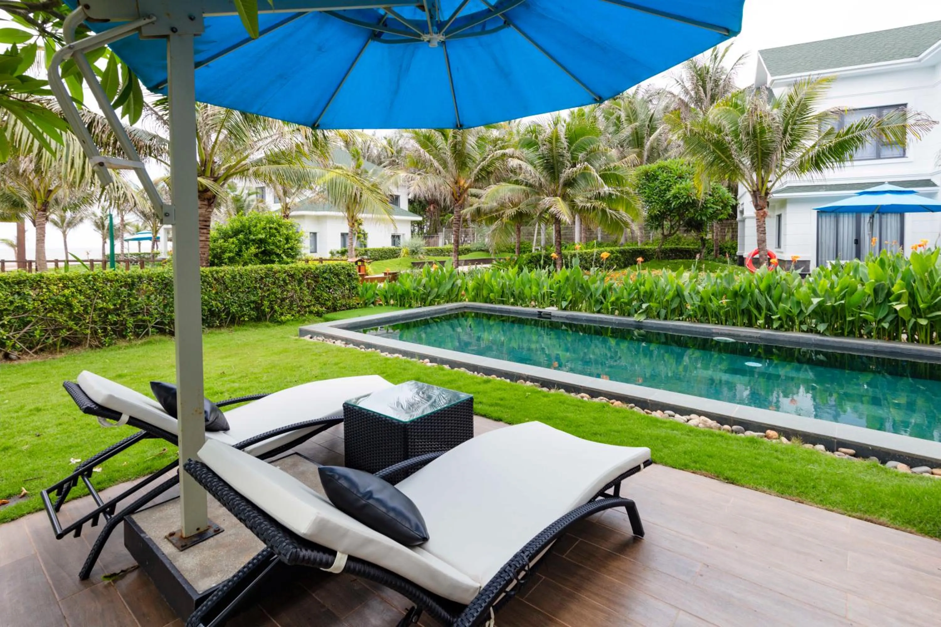 Swimming pool in Le Palmier Ho Tram Resort - Beachfront with Private Beach