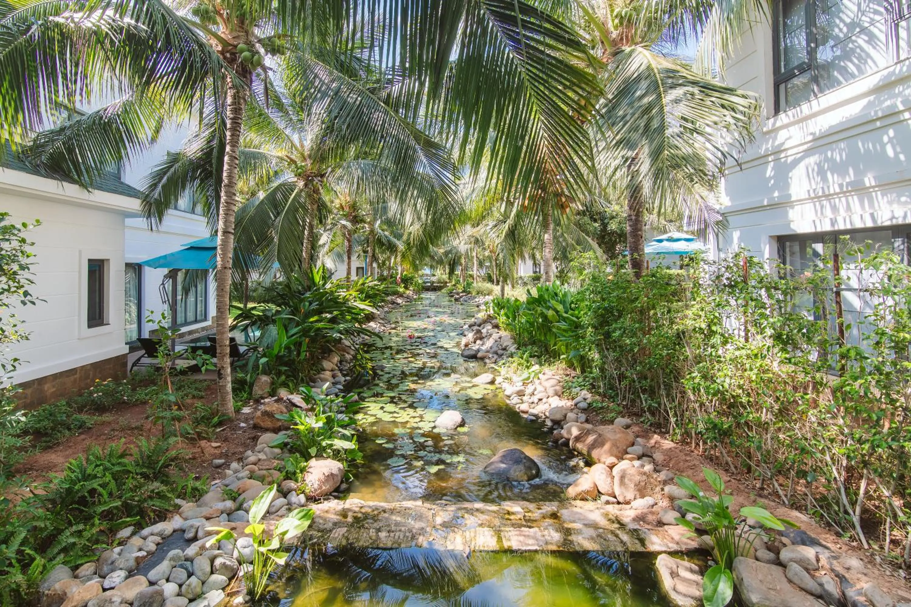 Garden in Le Palmier Ho Tram Resort - Beachfront with Private Beach