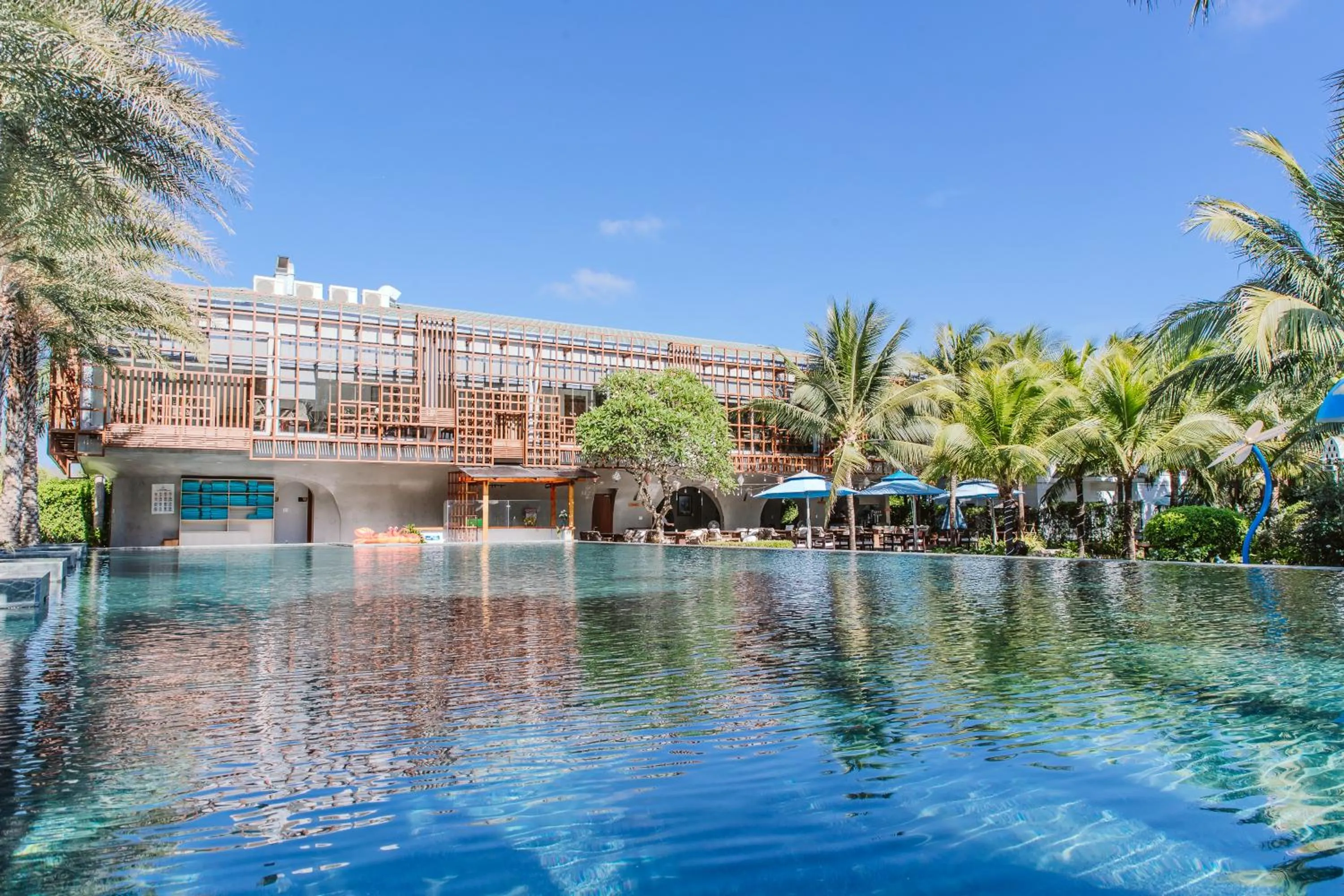 Swimming pool in Le Palmier Ho Tram Resort - Beachfront with Private Beach