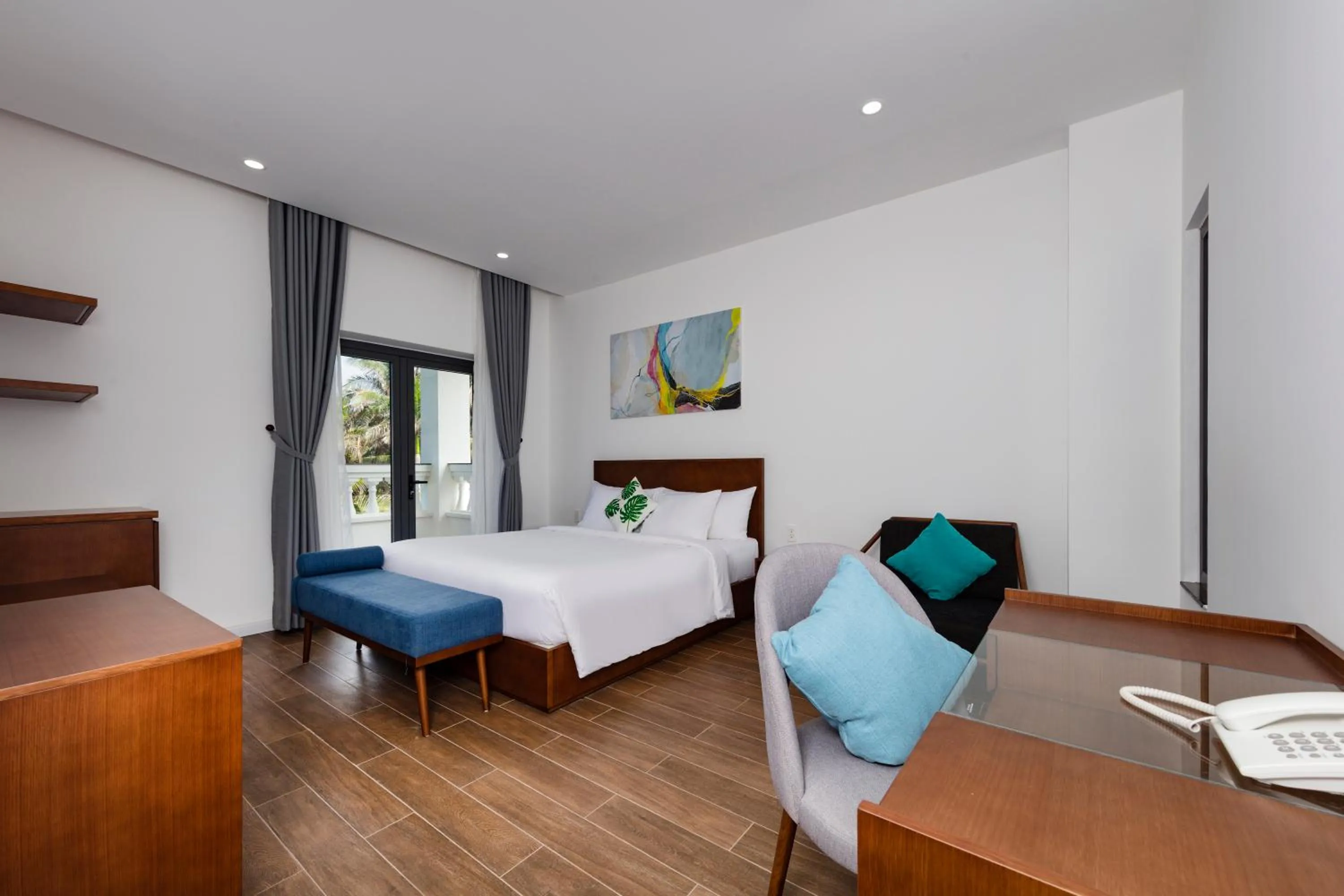 Bedroom, Bed in Le Palmier Ho Tram Resort - Beachfront with Private Beach