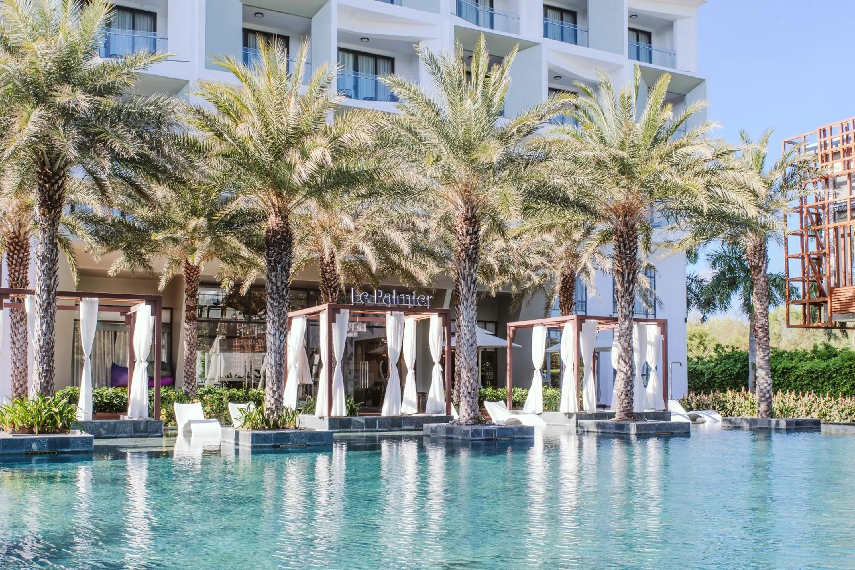 Swimming pool in Le Palmier Ho Tram Resort - Beachfront with Private Beach