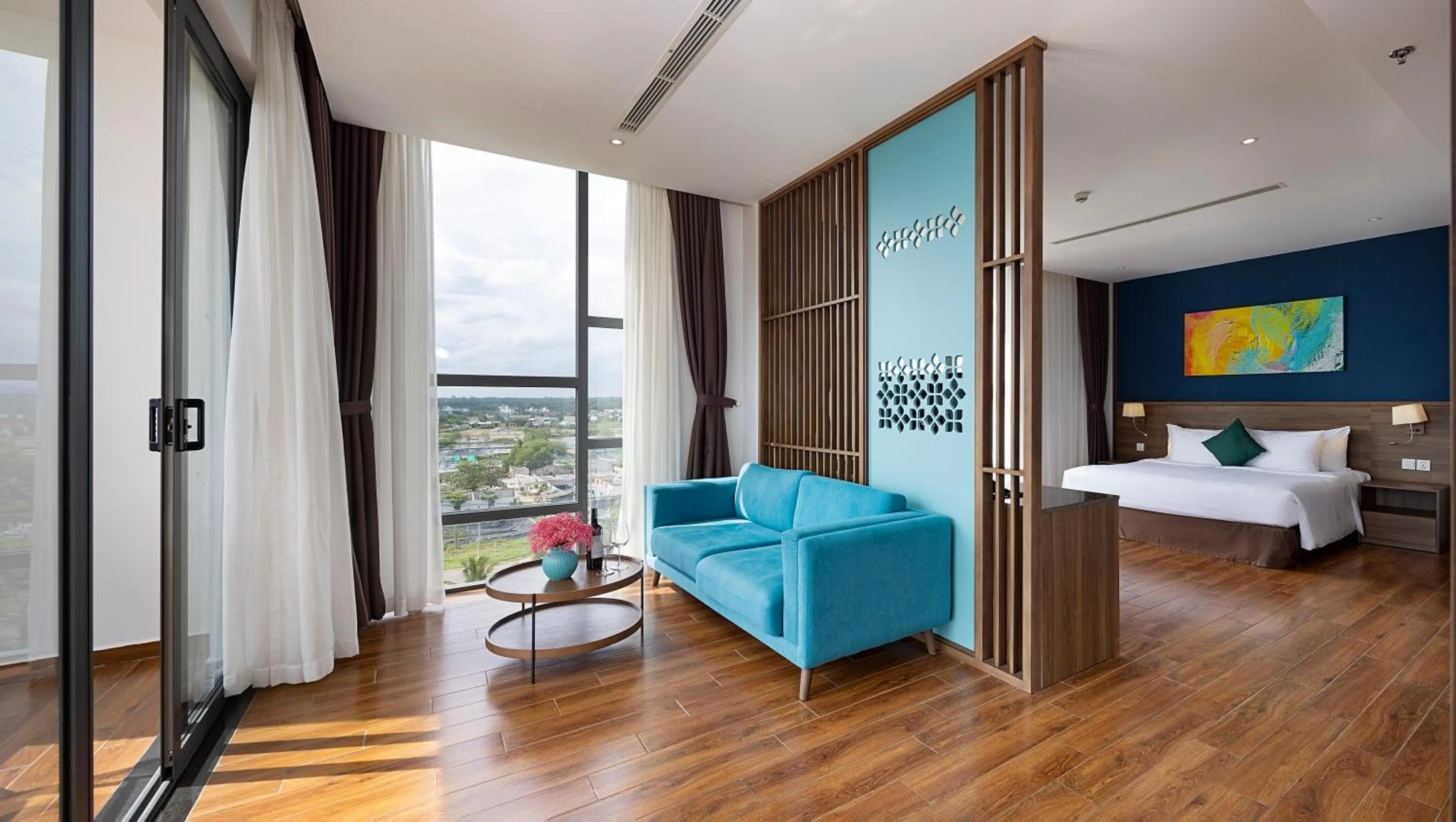 Seating area, Bed in Le Palmier Ho Tram Resort - Beachfront with Private Beach