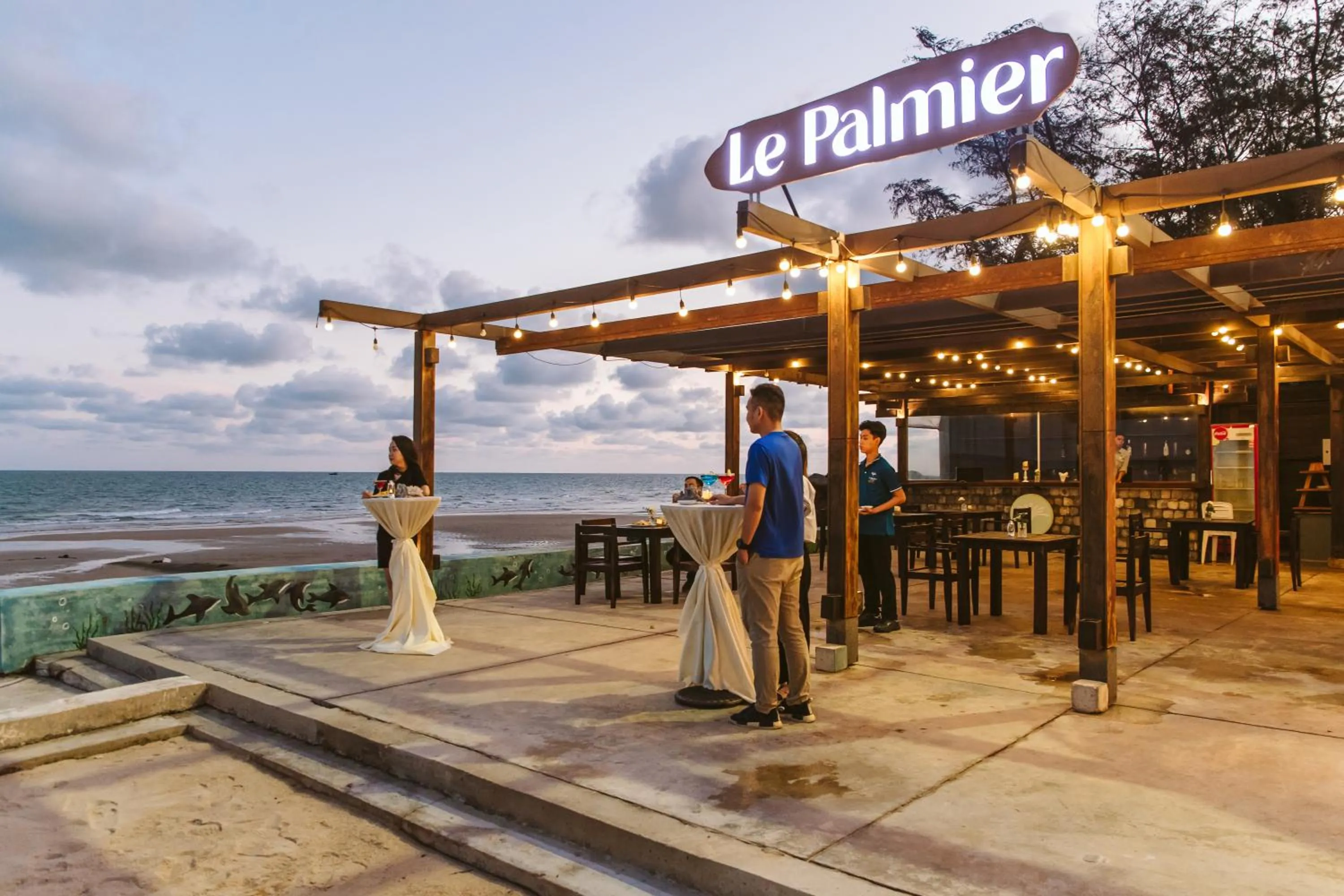 Lounge or bar in Le Palmier Ho Tram Resort - Beachfront with Private Beach
