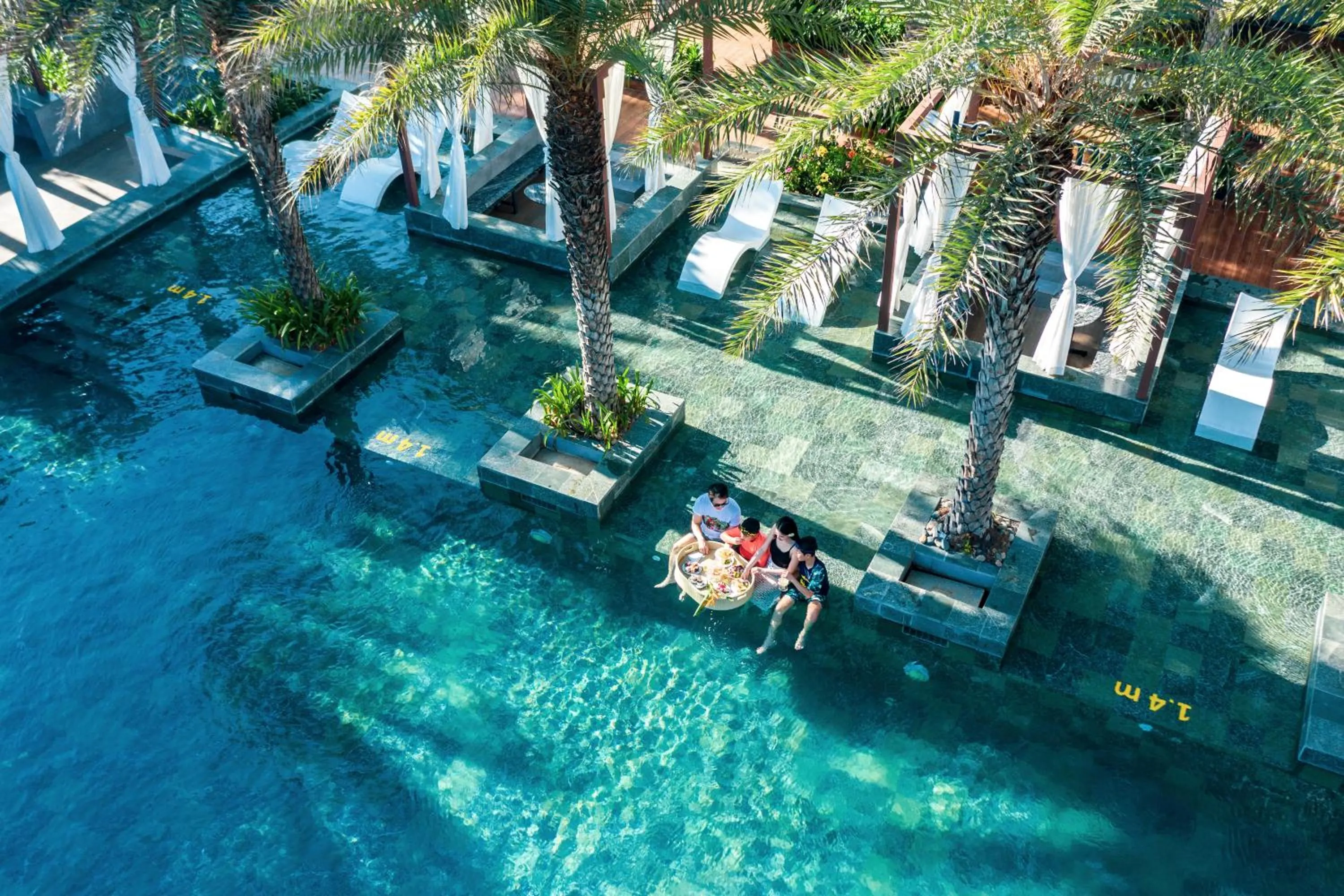 Swimming pool in Le Palmier Ho Tram Resort - Beachfront with Private Beach