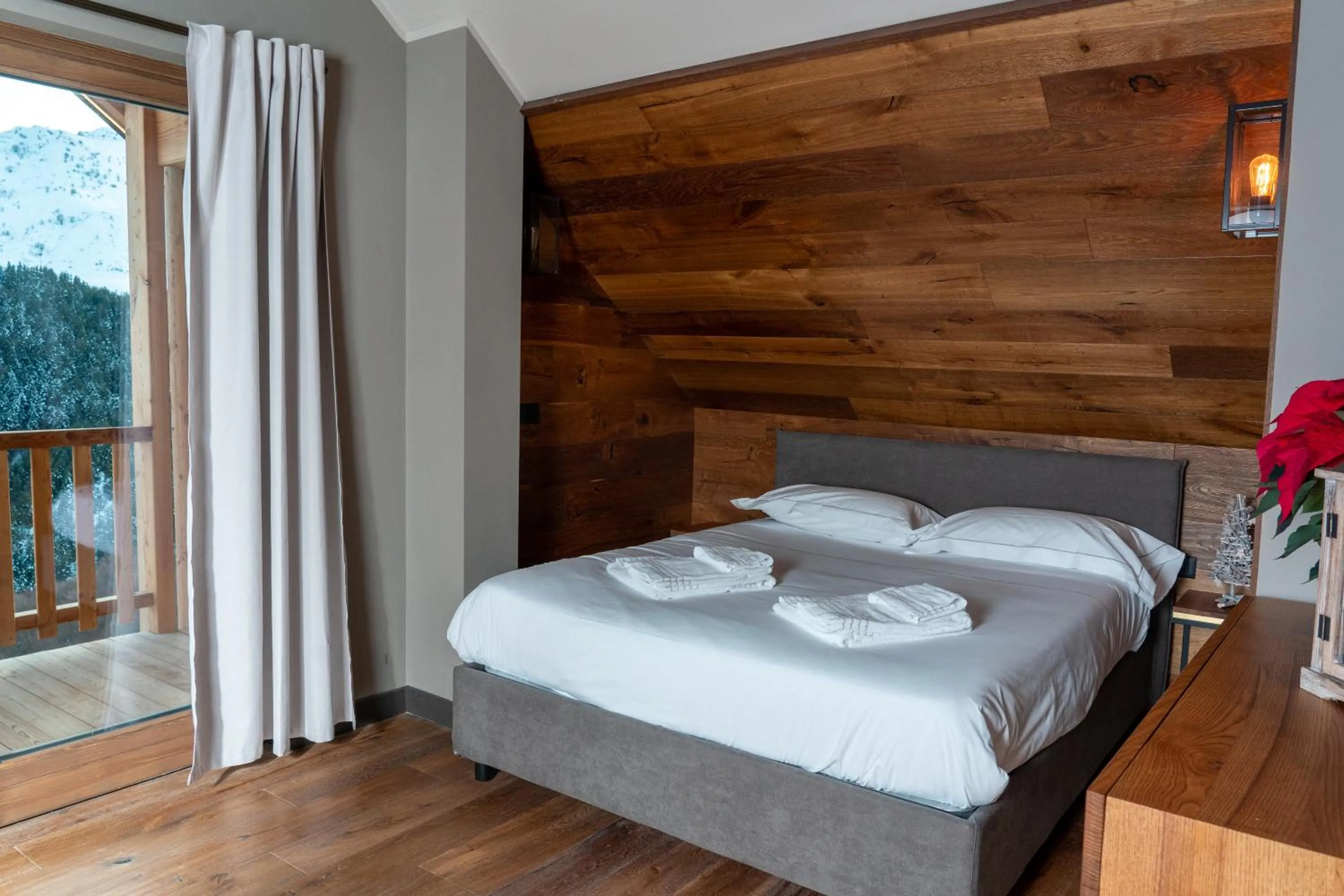 Bed in Chalet Everest - Luxury Apartments