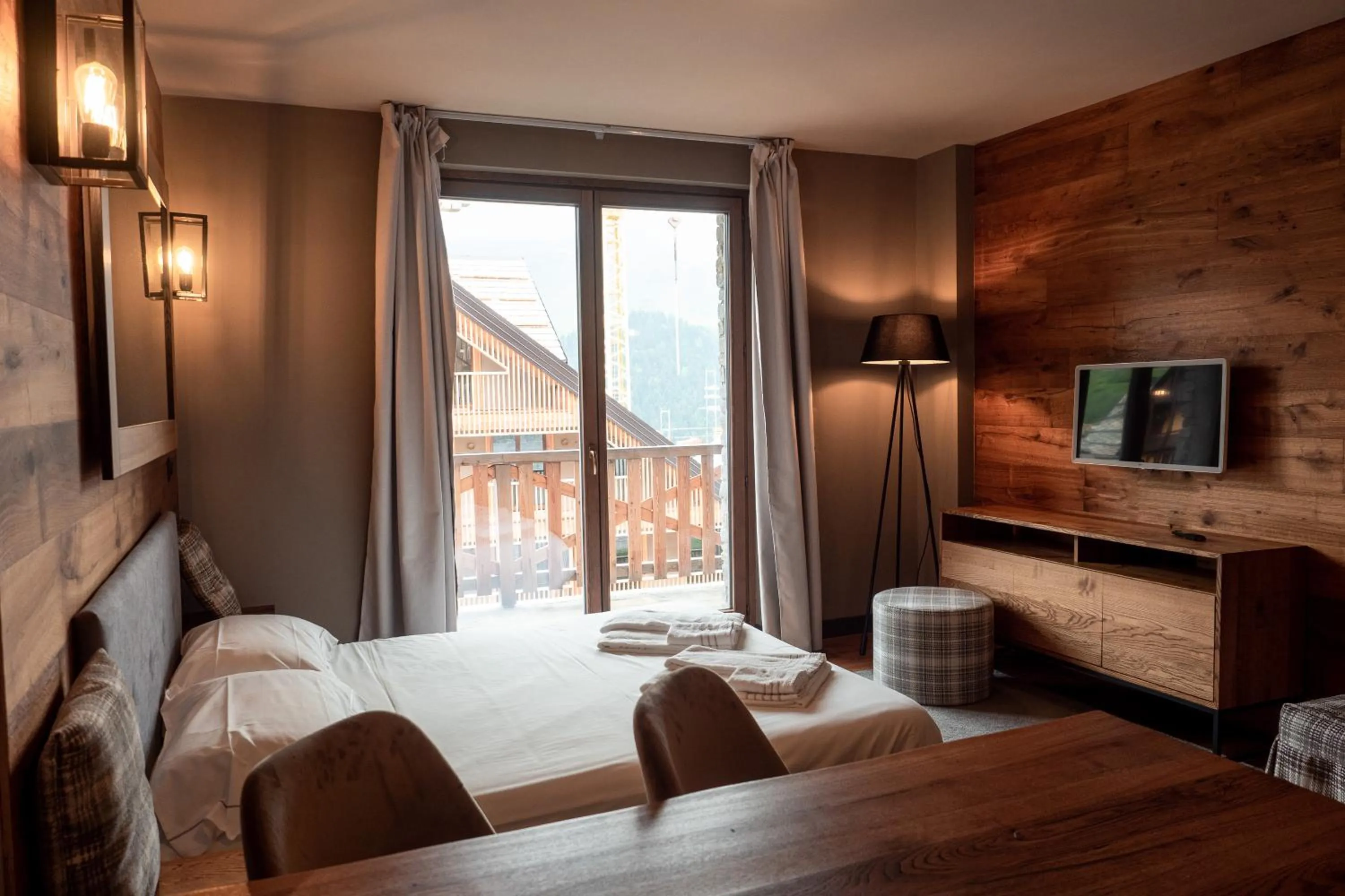 Bed in Chalet Everest - Luxury Apartments