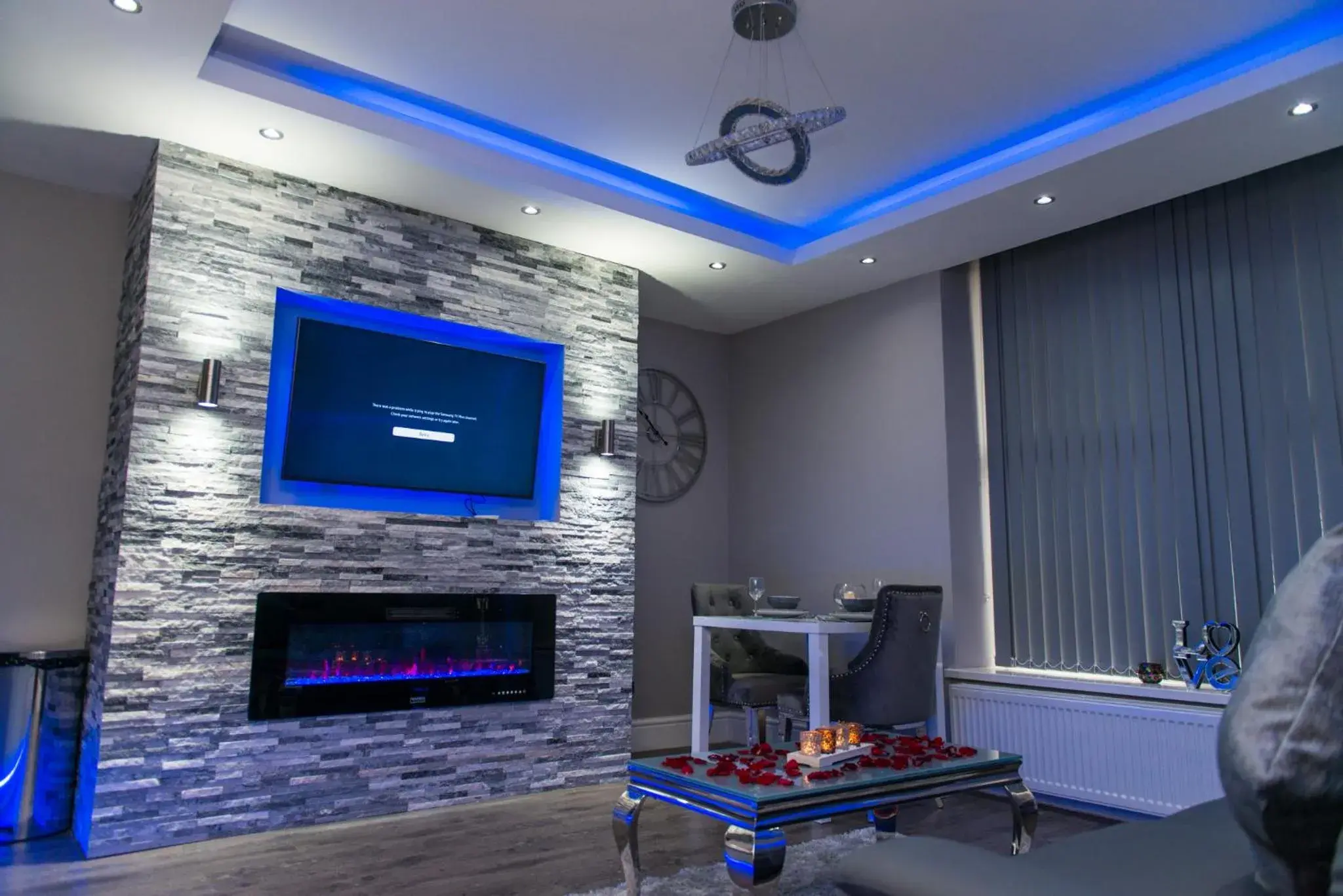 Living room, TV/Entertainment Center in Aphrodite Suites Huddersfield