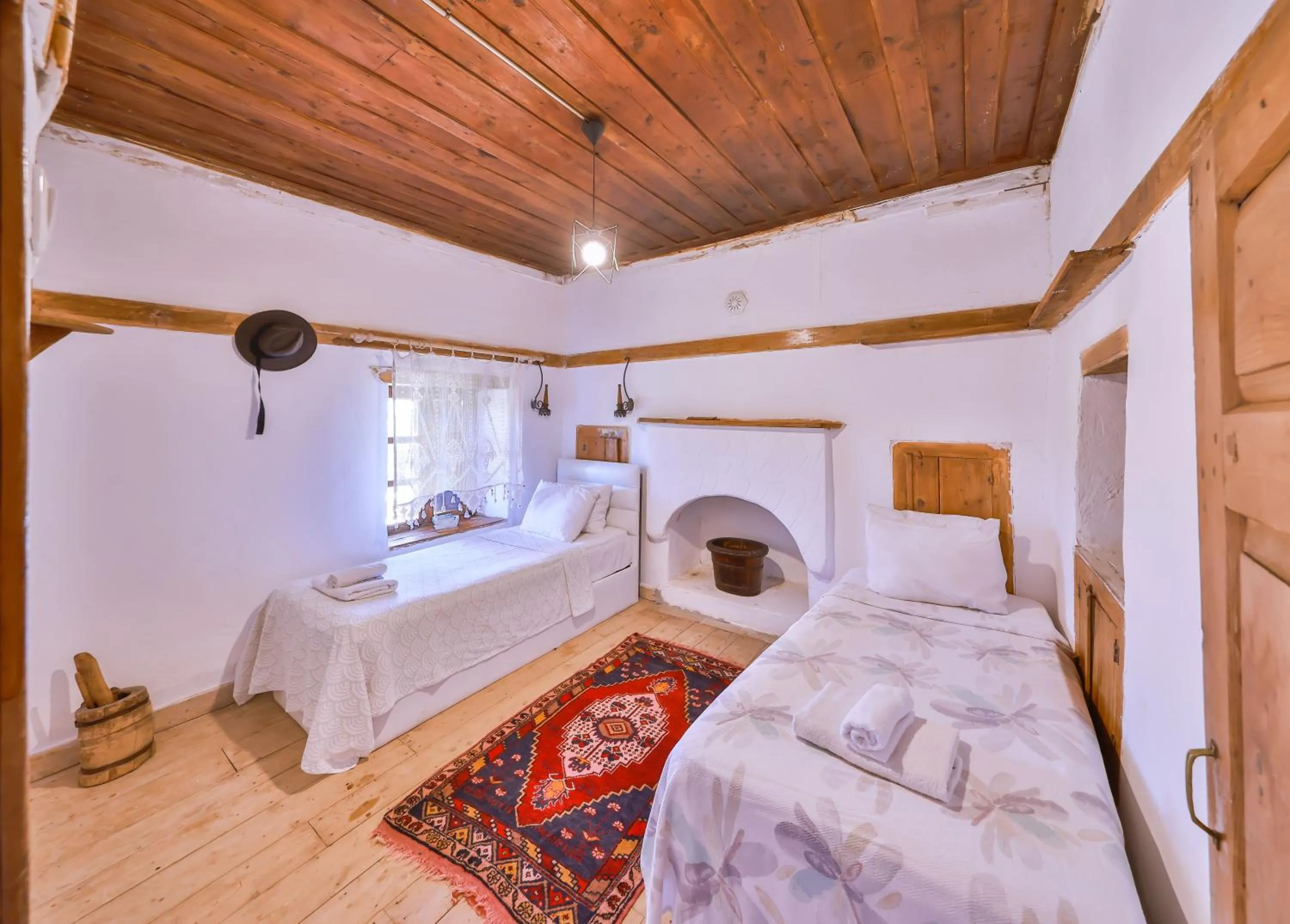 Bed in Bademlique Stone Rooms