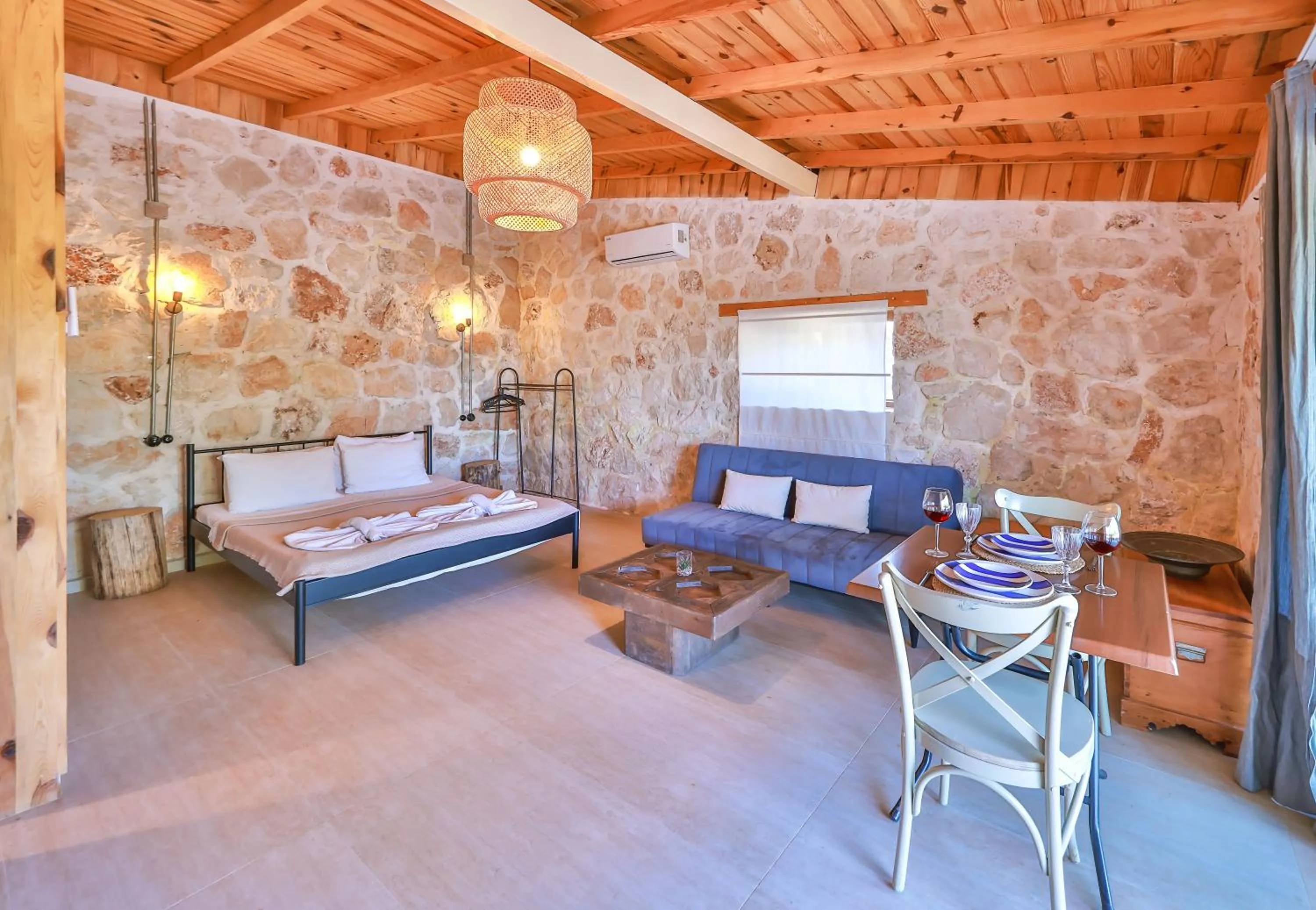 Bed in Bademlique Stone Rooms