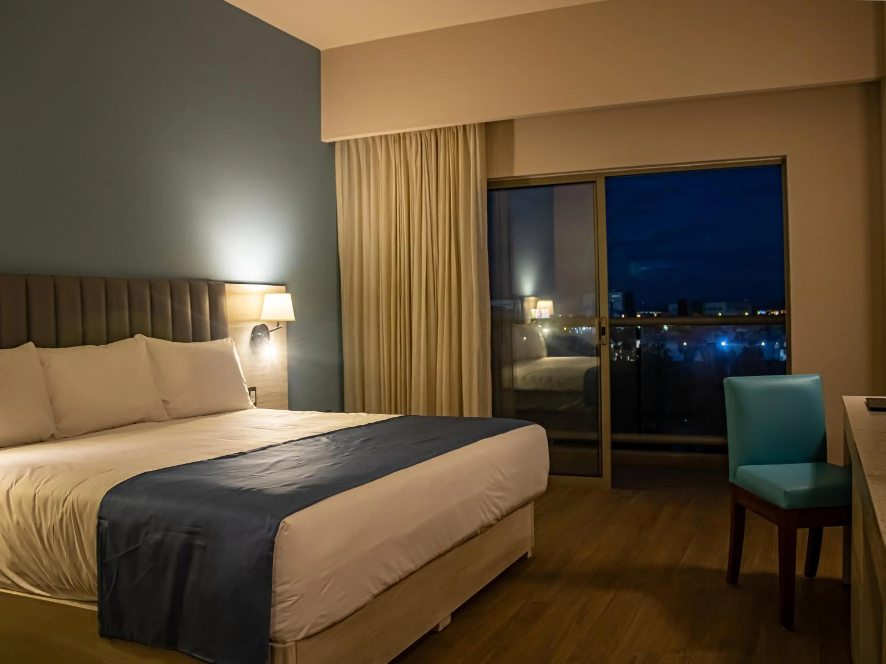 Bed in Varali Grand Hotel