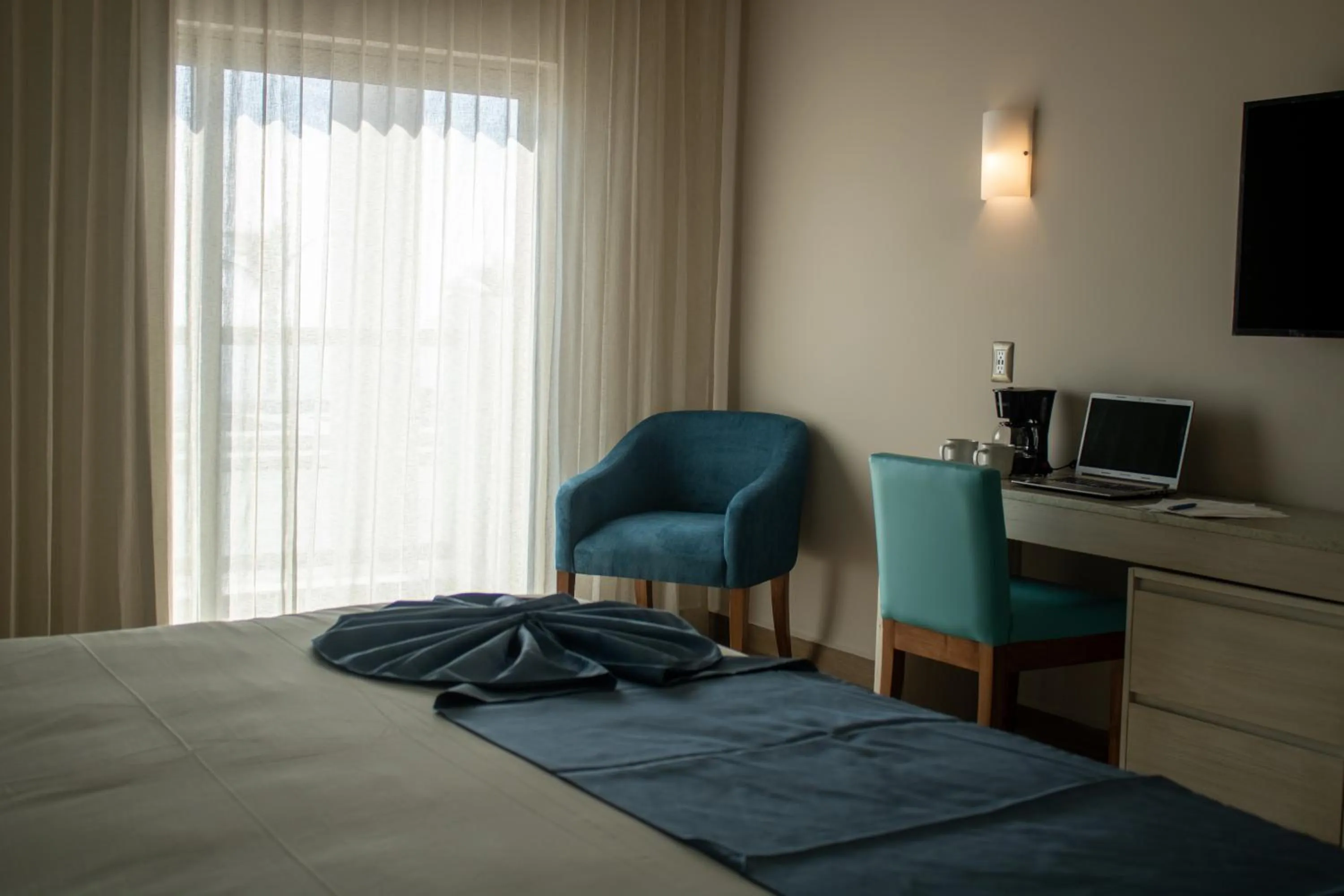 Bed in Varali Grand Hotel