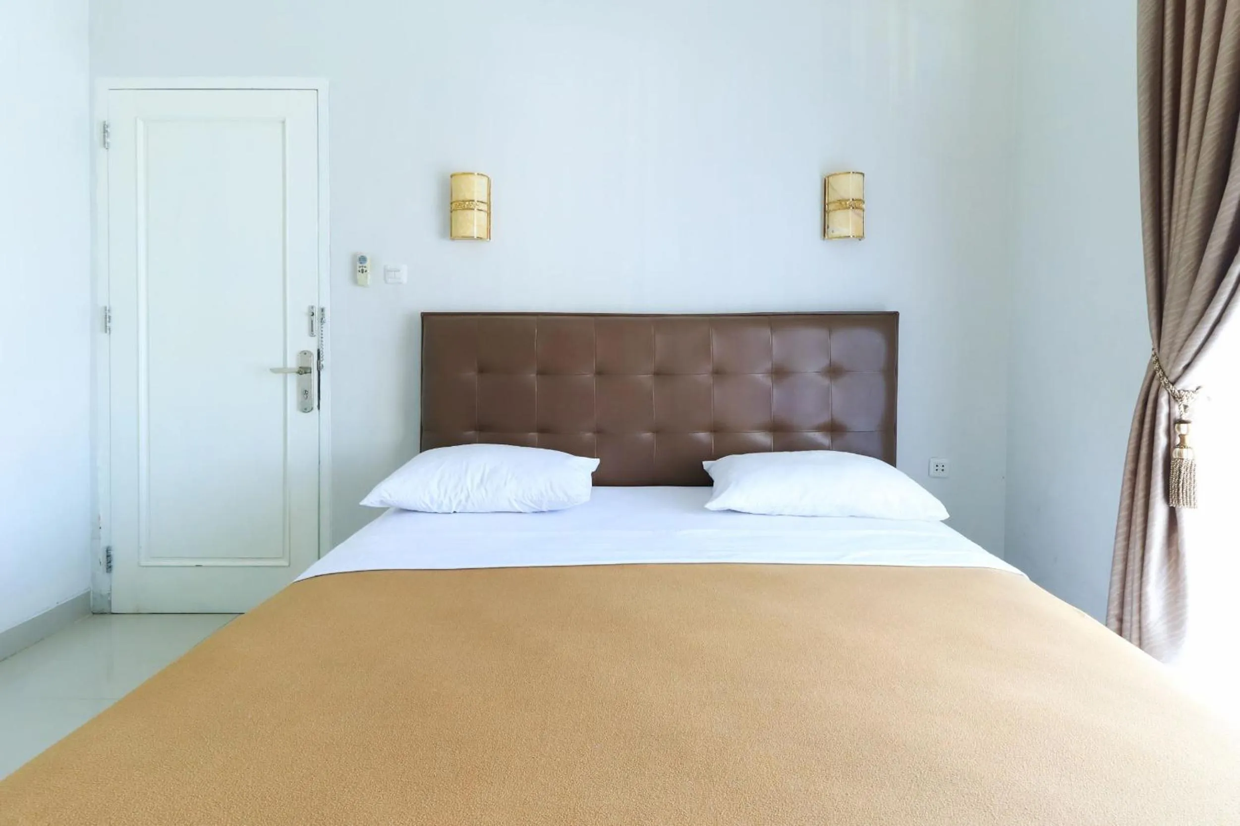 Photo of the whole room, Bed in Ge JacMart Homestay Makassar