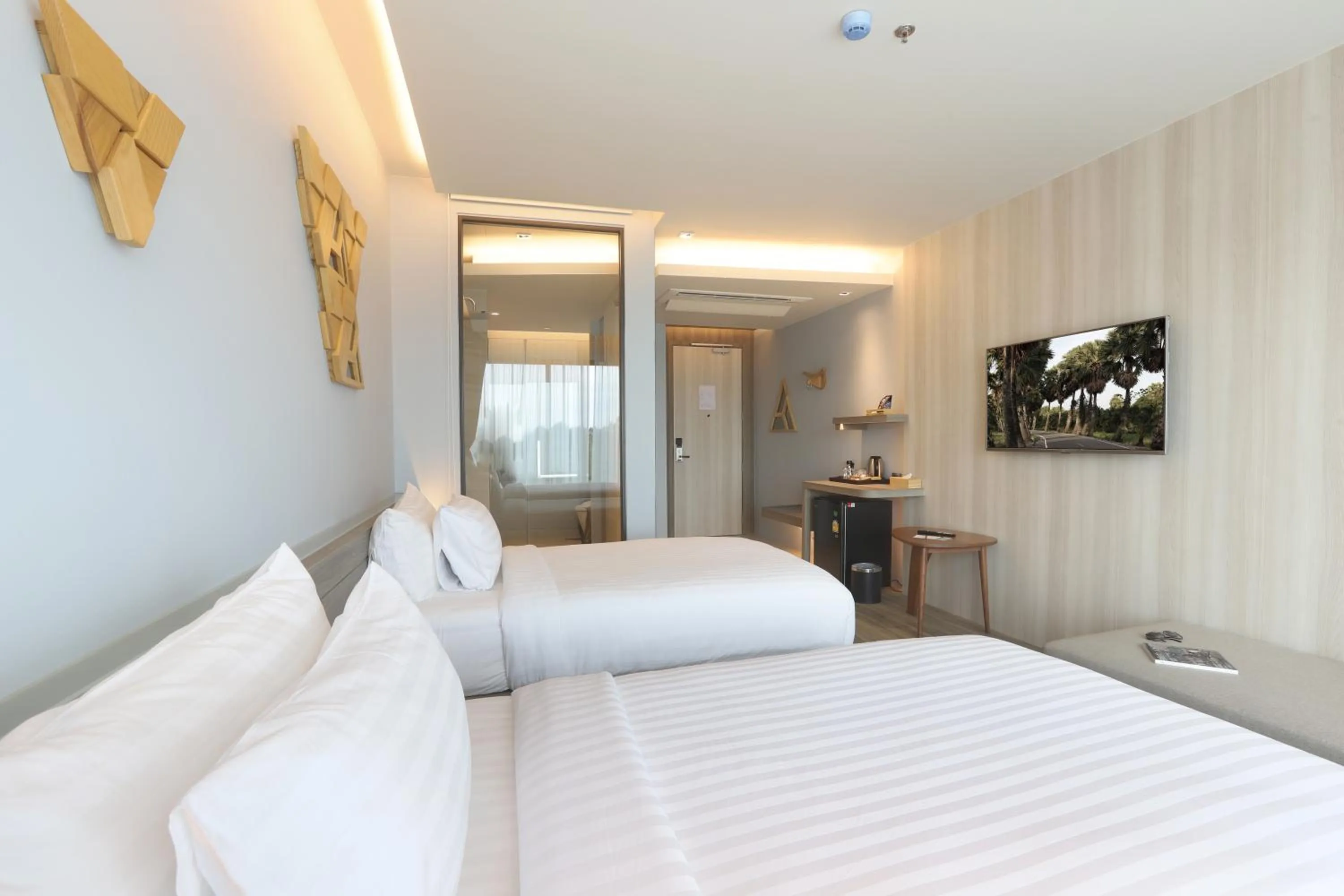 Bed in The Signature Hotel Airport