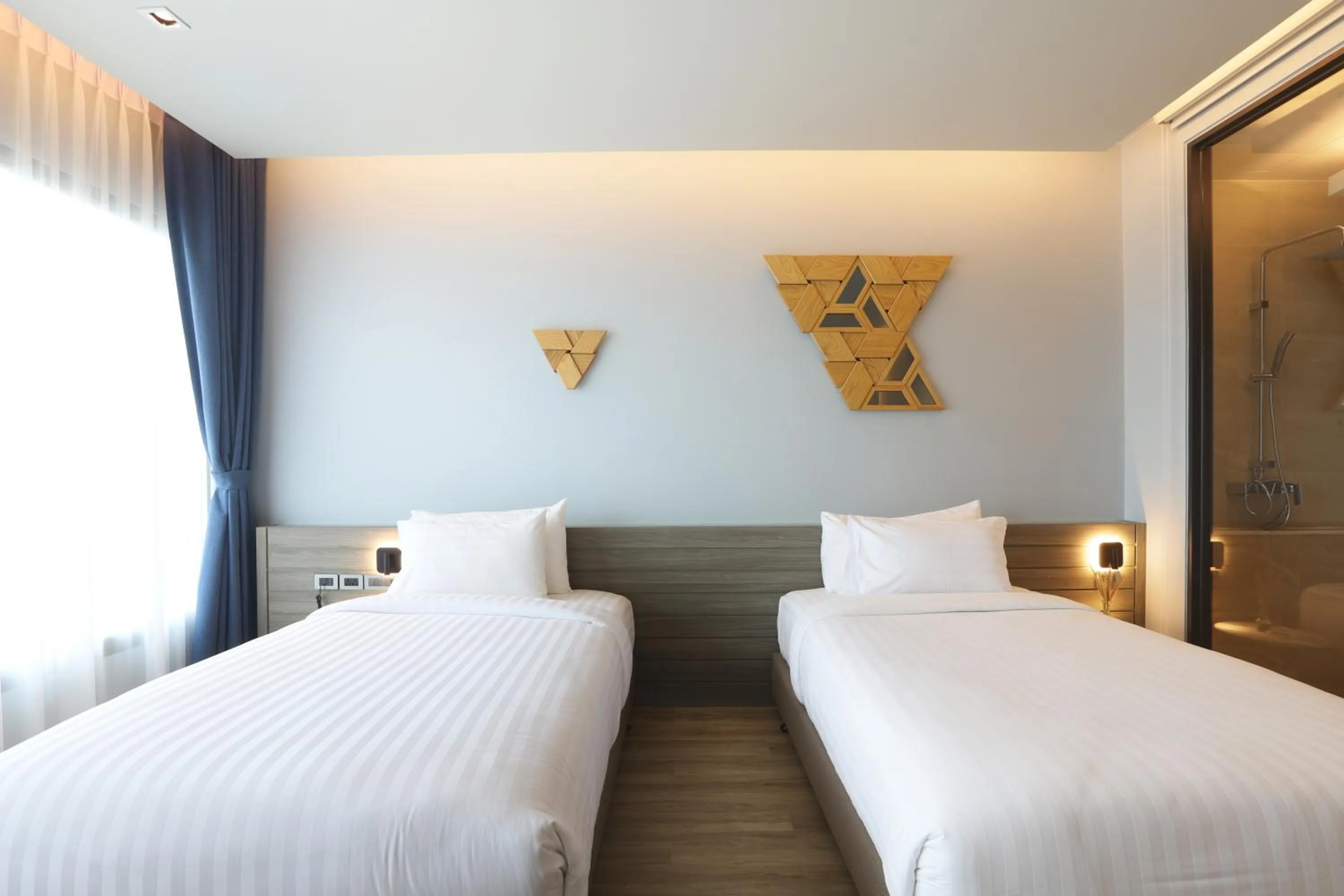 Bed in The Signature Hotel Airport