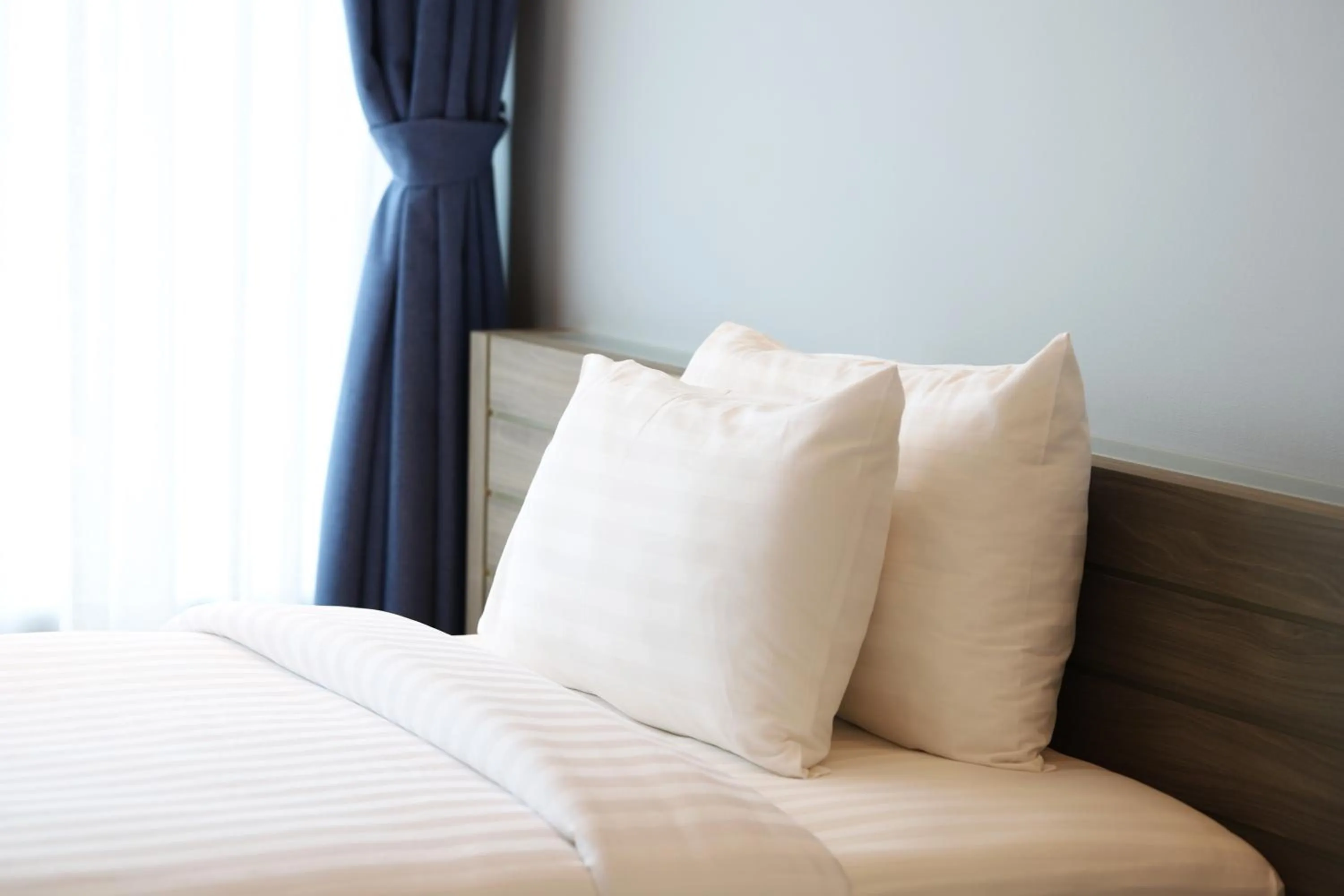 Bed in The Signature Hotel Airport