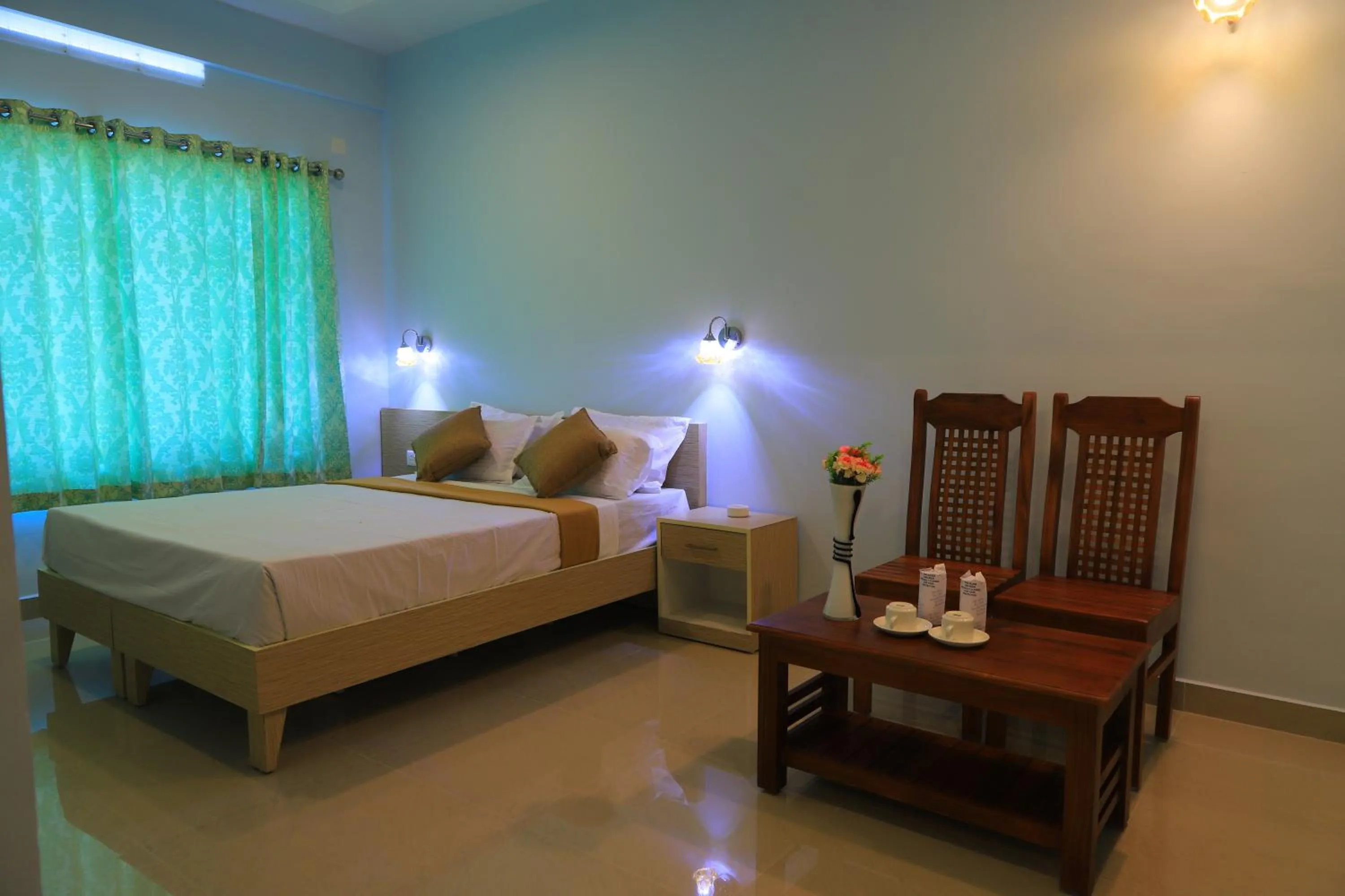 Bed in T Homes Thekkady