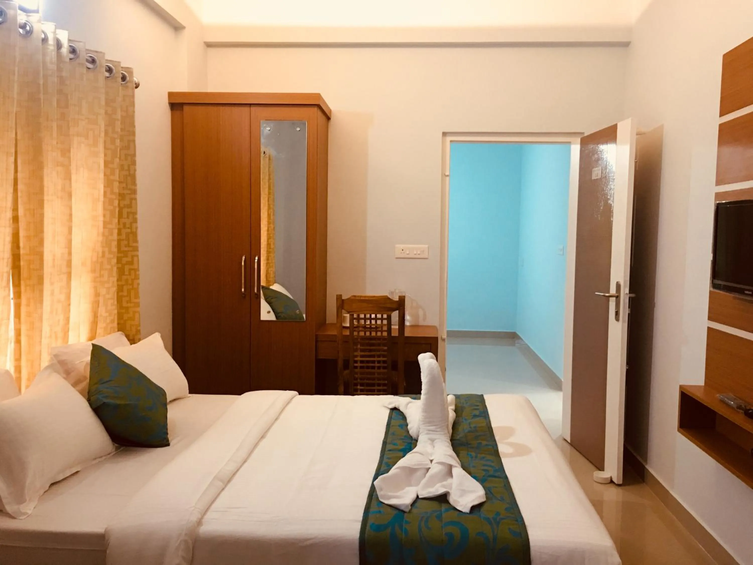 Bed in T Homes Thekkady