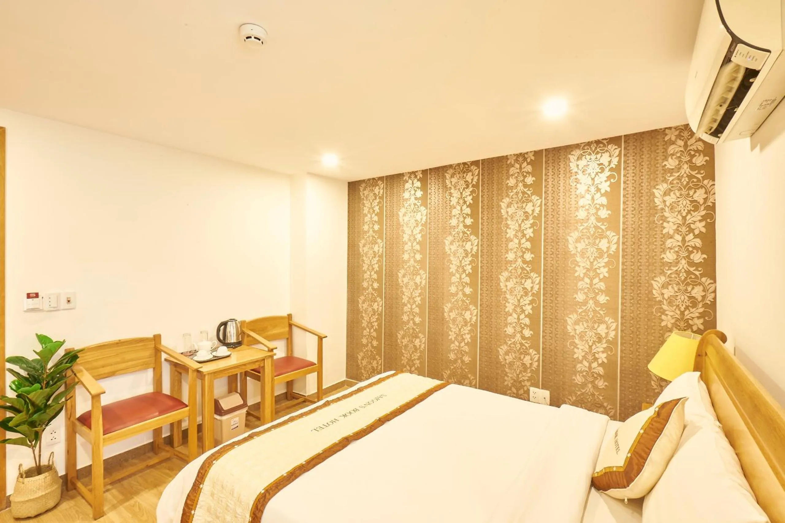 Photo of the whole room, Bed in Sai Gon's Book Hotel - The Airport Front