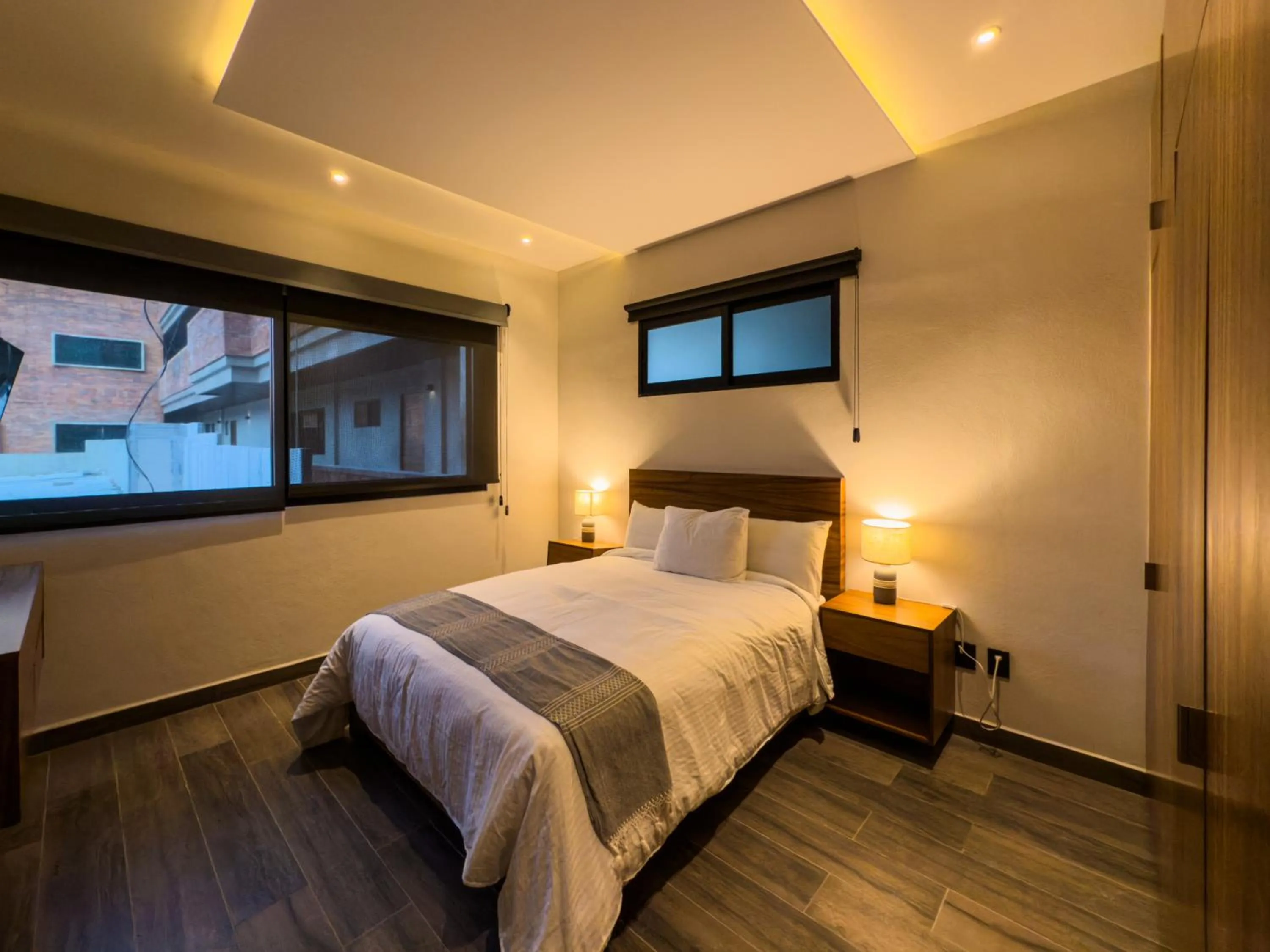 Bed in Nimue Marina Residence