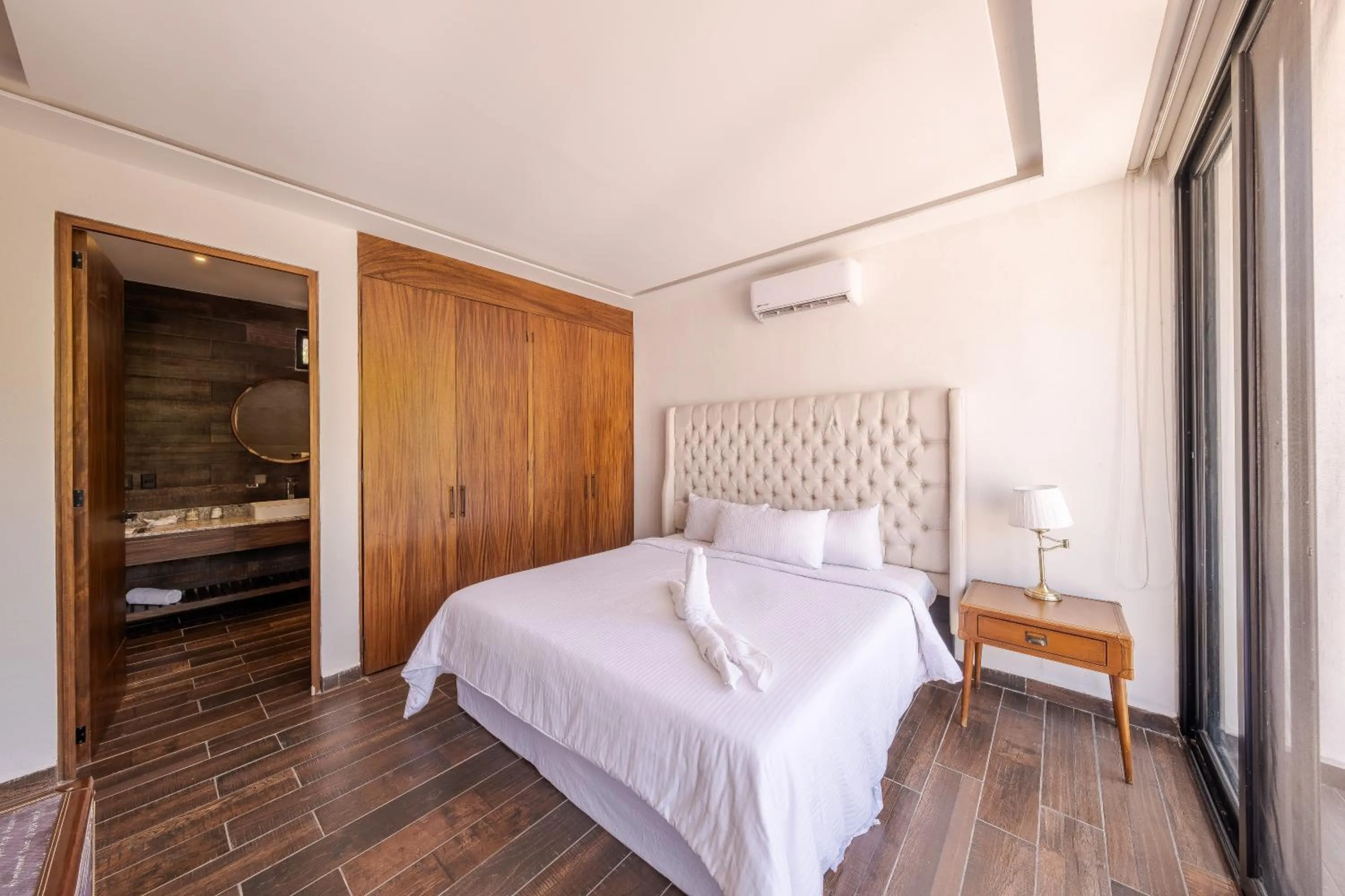 Bed in Nimue Marina Residence