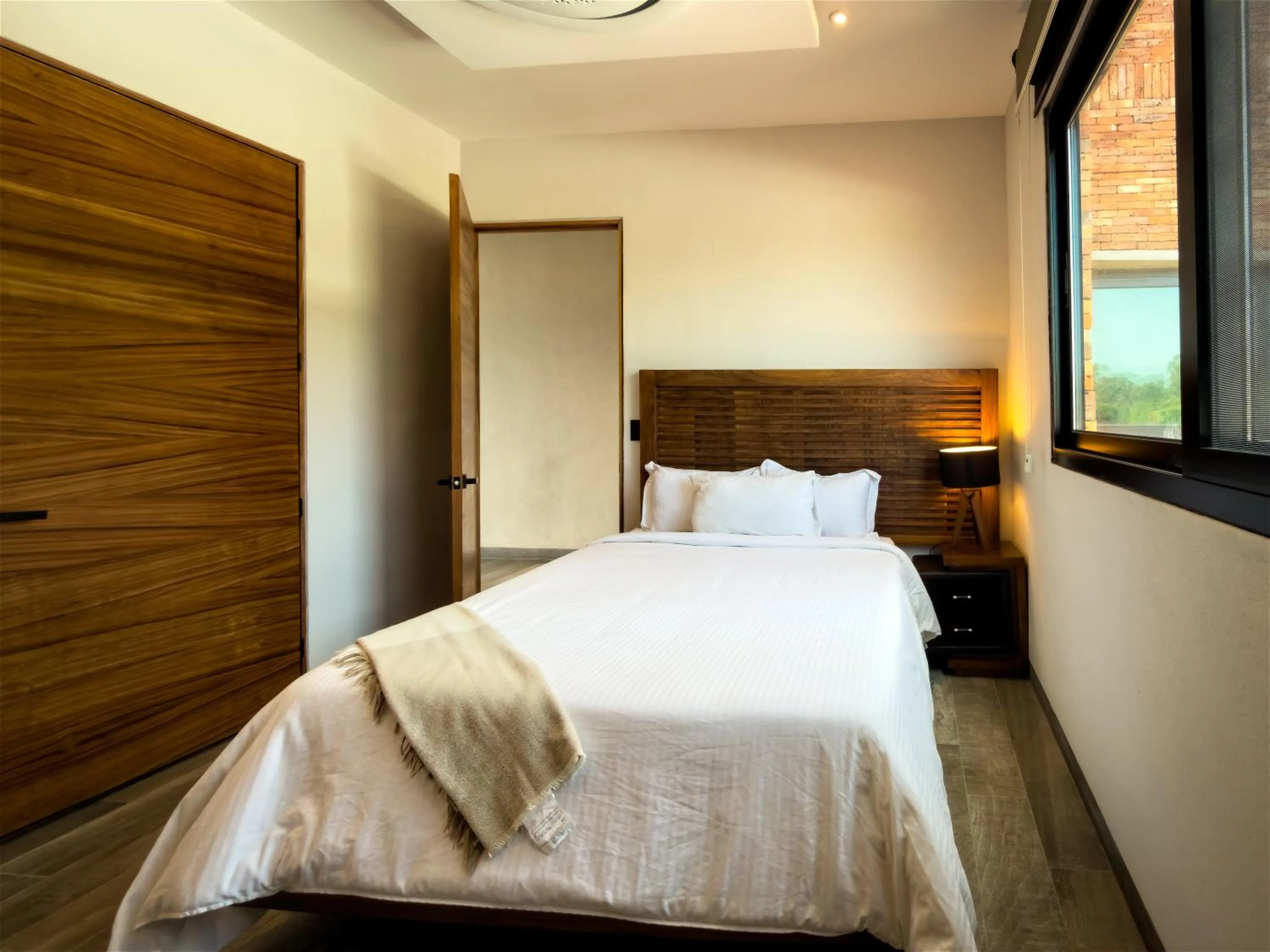 Bed in Nimue Marina Residence